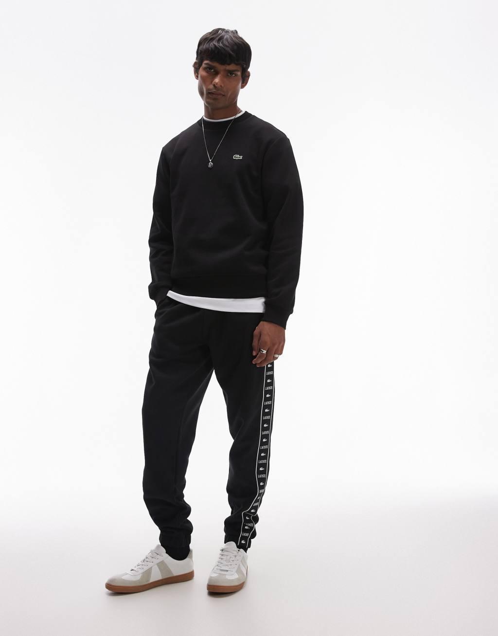 Lacoste essentials logo sweatshirt in black Product Image