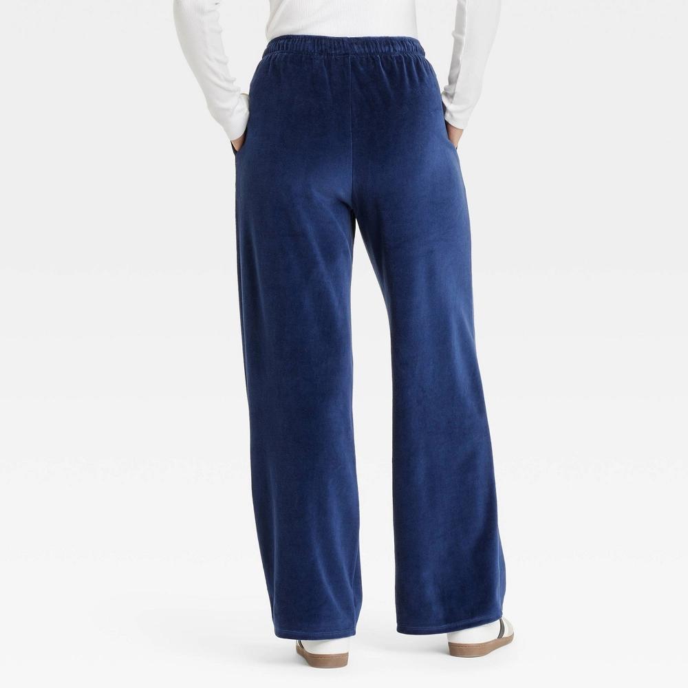 Women's Leisure Studio Mid-Rise Velour Sweatpants - Universal Thread™ Navy Blue S Product Image