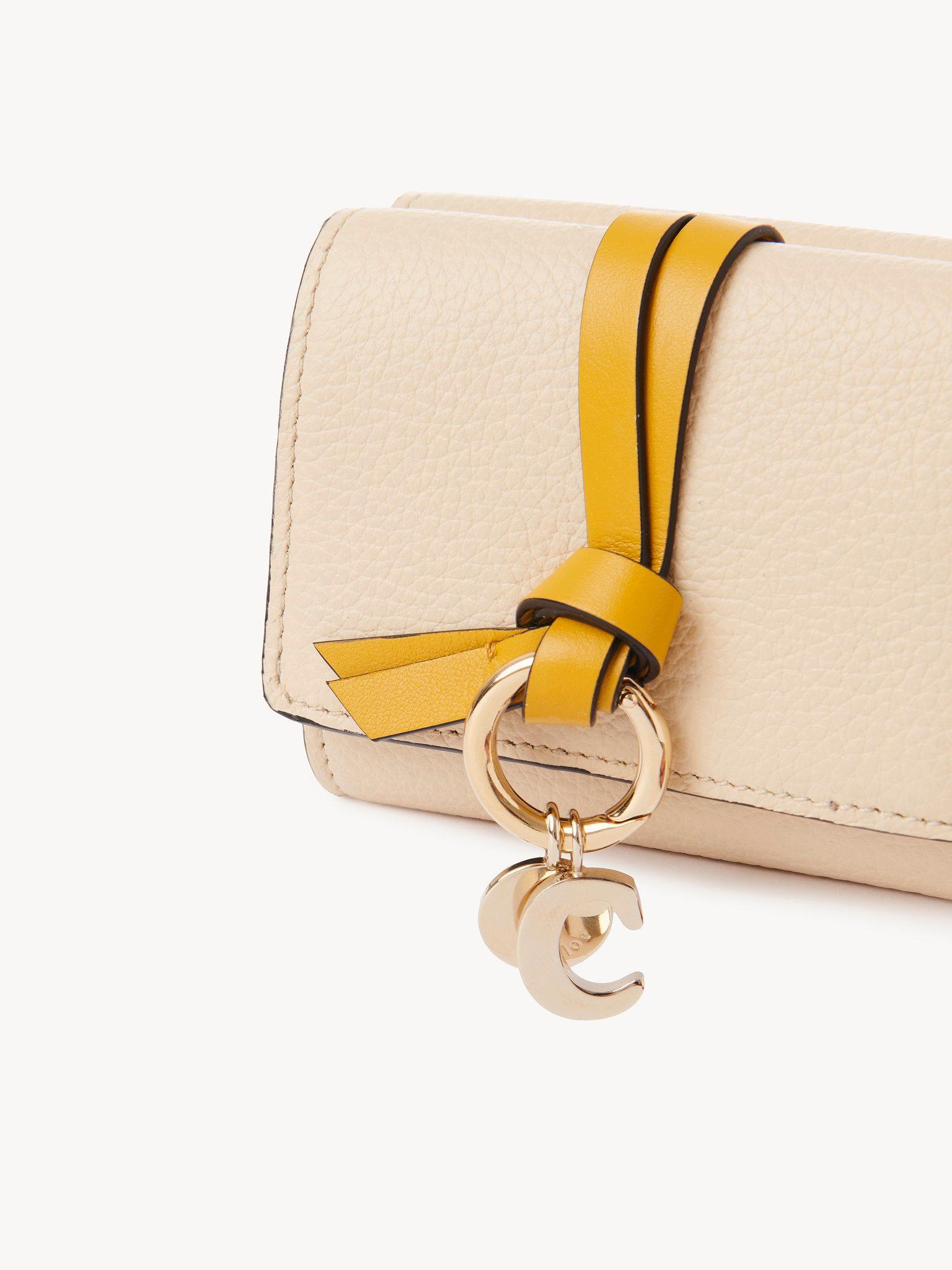 Small Alphabet tri-fold in grained leather Product Image