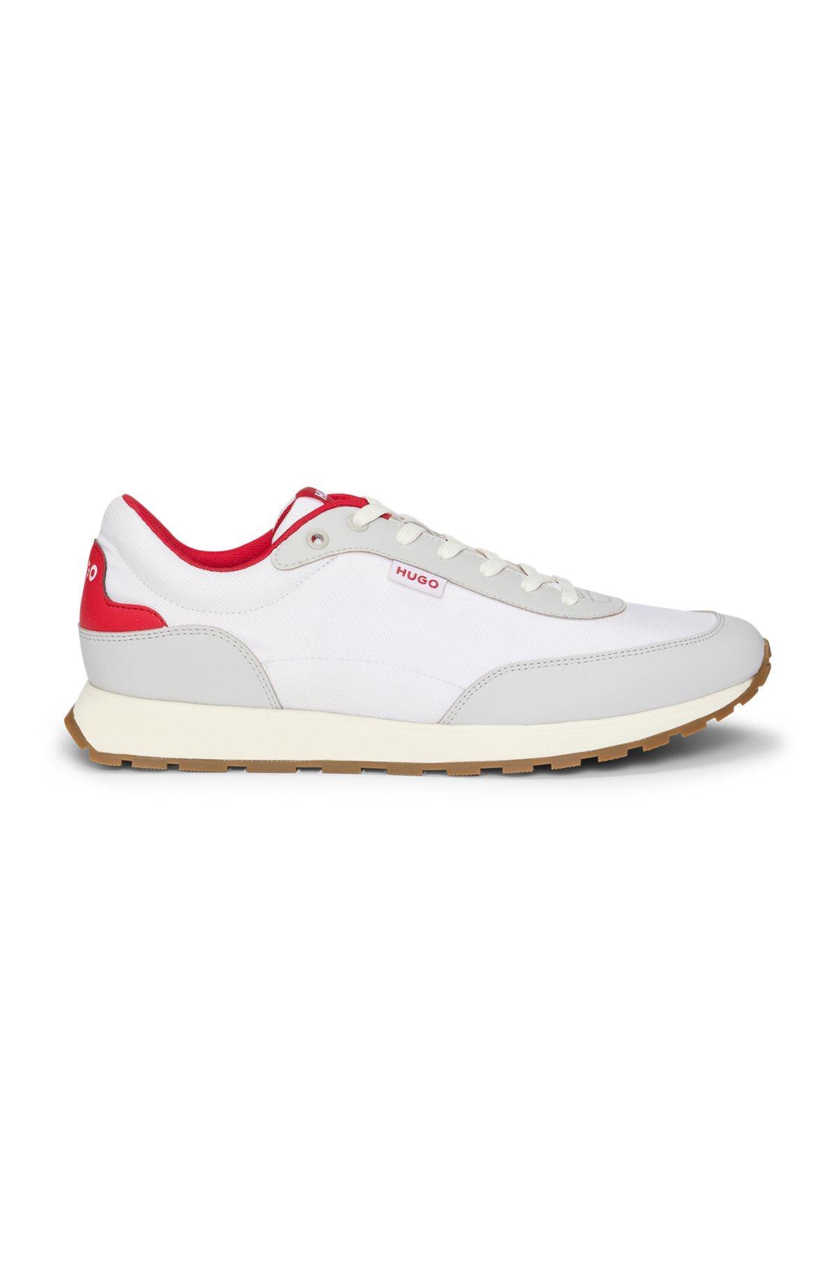 Mixed-material trainers with logo flag Product Image