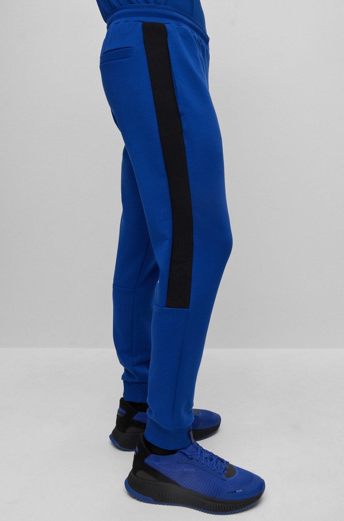 Cotton-blend tracksuit bottoms with side-stripe tape Product Image
