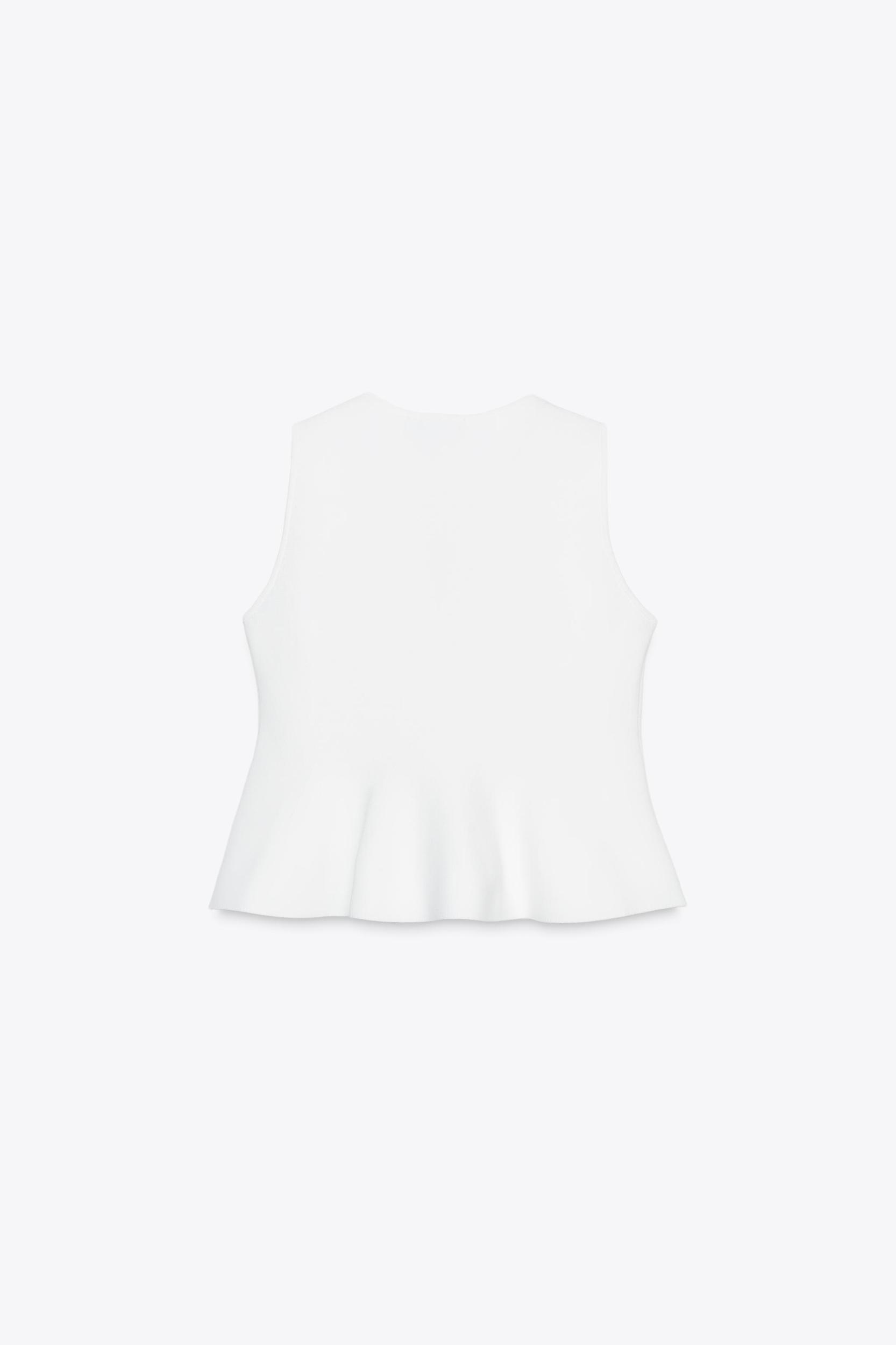 PEPLUM KNIT TOP Product Image