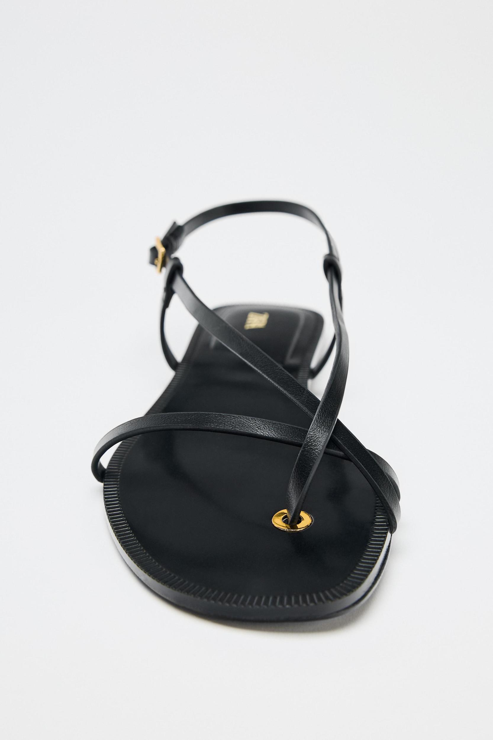 LOW HEELED SANDALS WITH METAL DETAIL Product Image