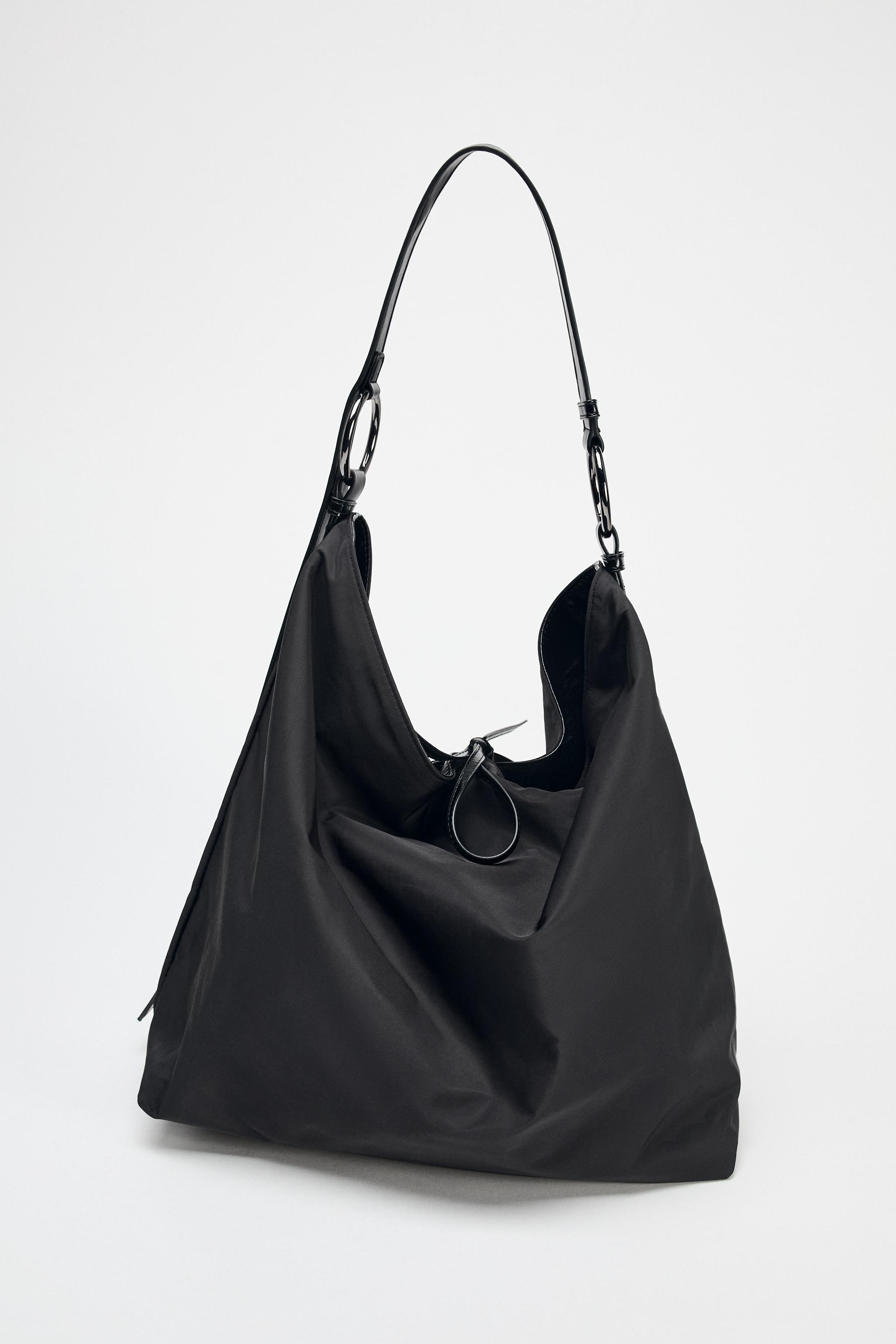 REVERSIBLE SLOUCHY BUCKET BAG Product Image