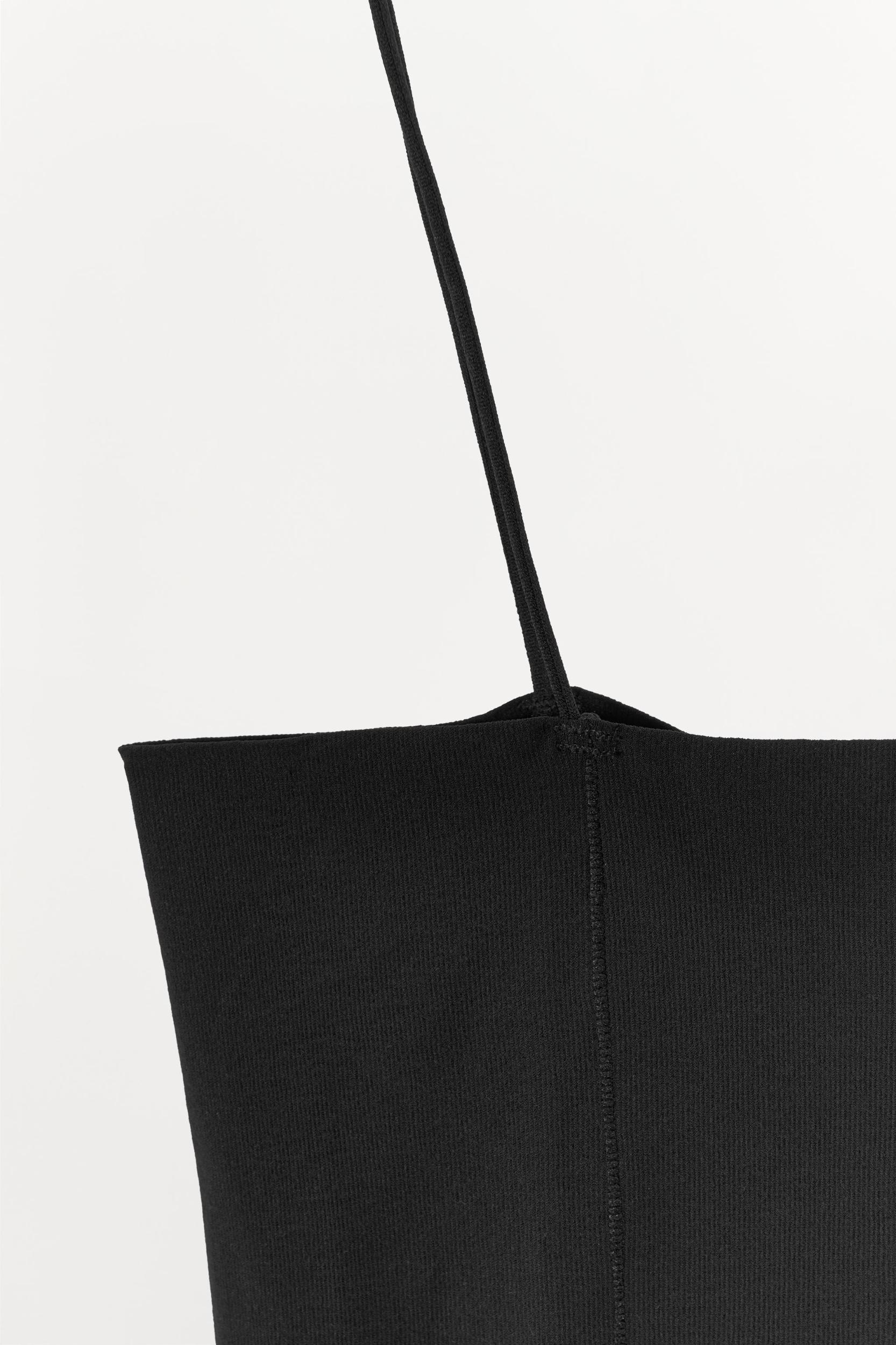FITTED STRAPPY BODYSUIT WITH SEAMS Product Image