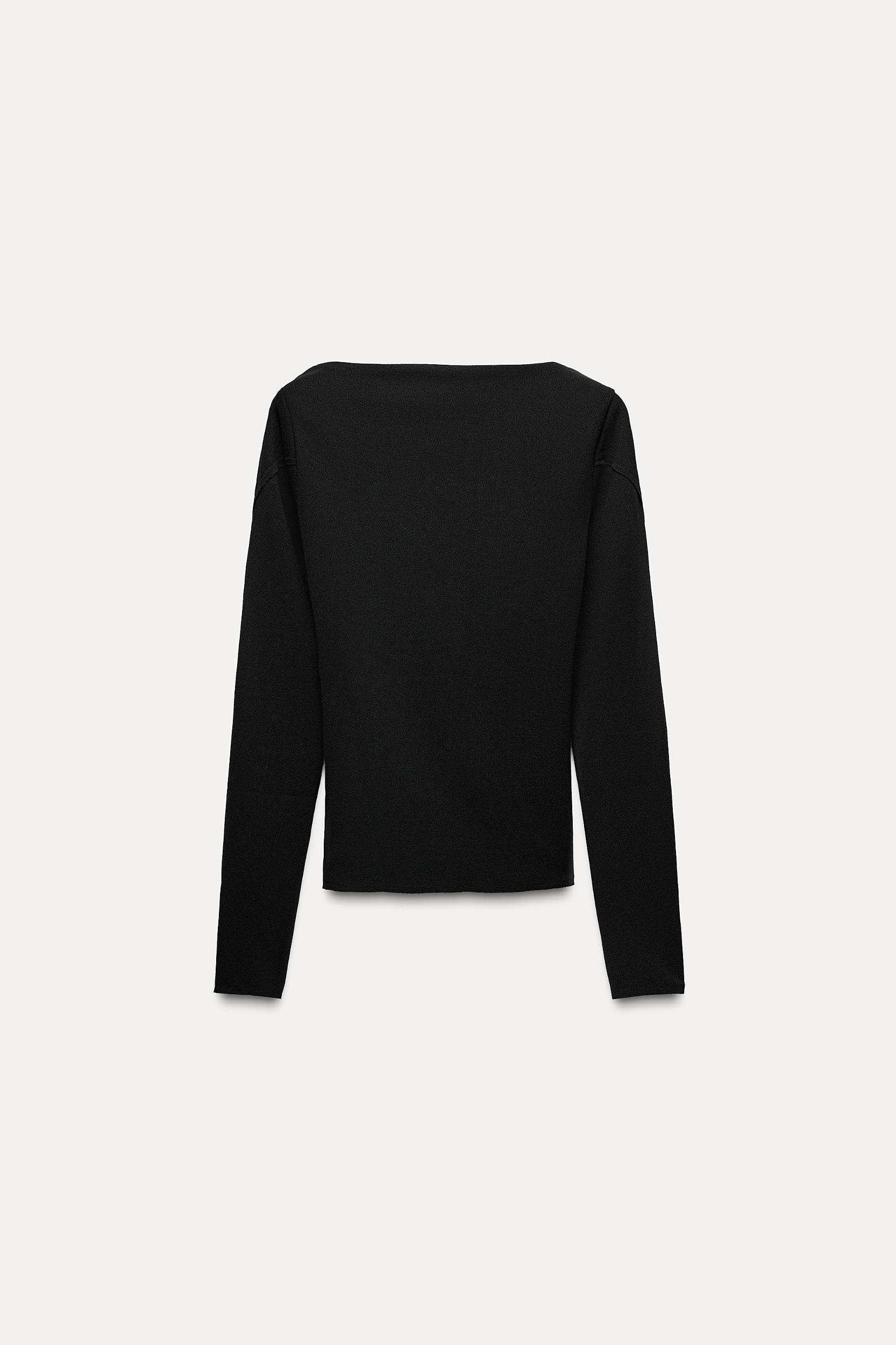 VENTED SLEEVE TOP Product Image
