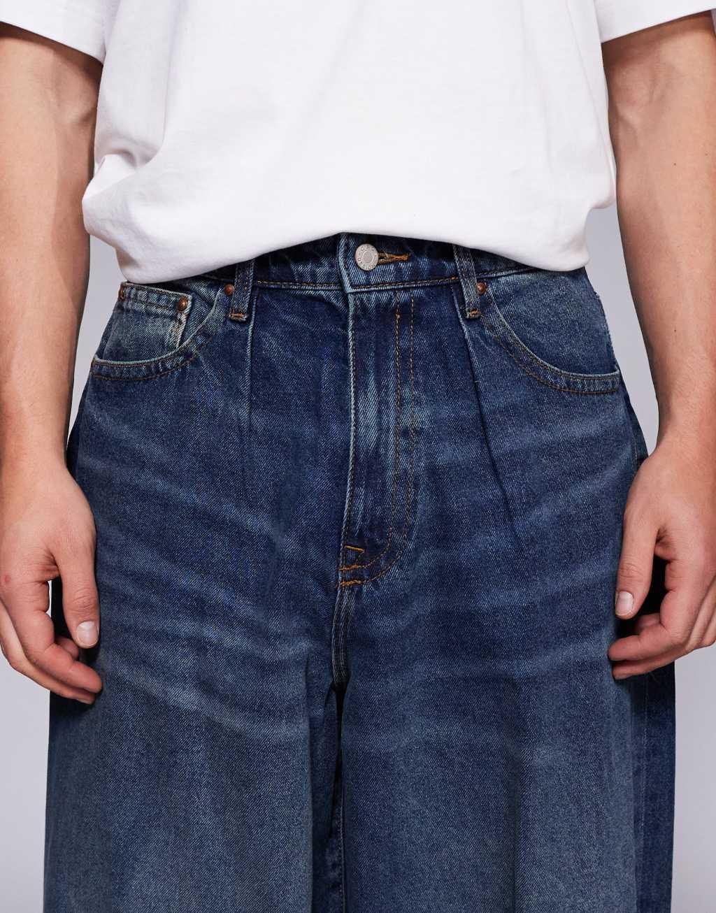 ASOS DESIGN oversized baggy fit jeans in vintage dark wash blue Product Image