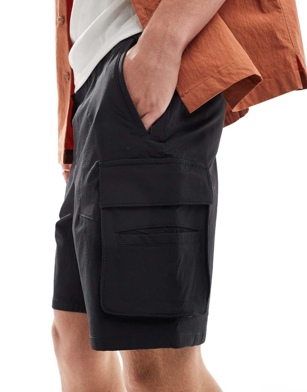 Bershka nylon cargo pocket shorts in black Product Image