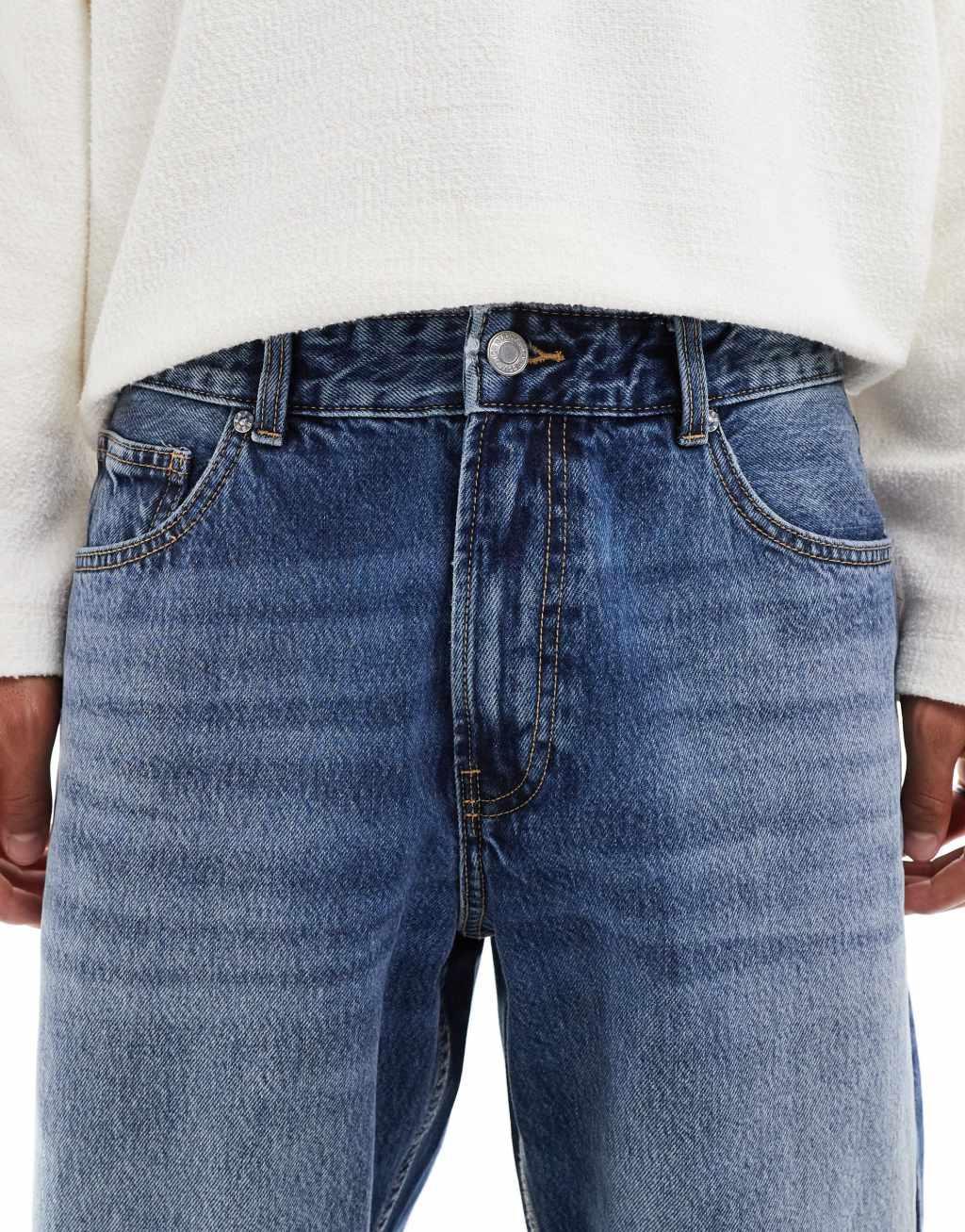 Bershka washed horseshoe jeans in blue  Product Image