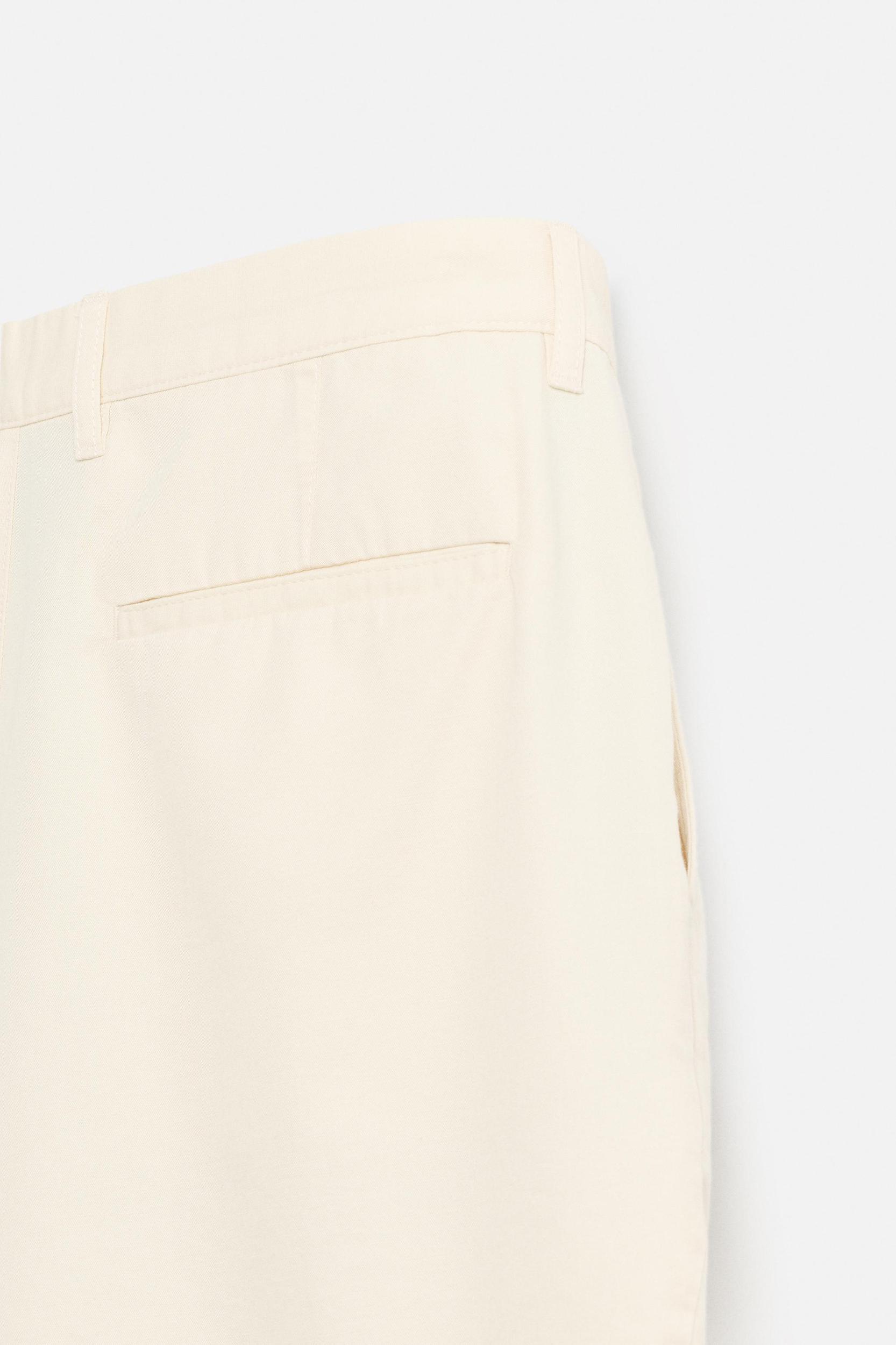 PLEATED REGULAR FIT BERMUDA SHORTS Product Image