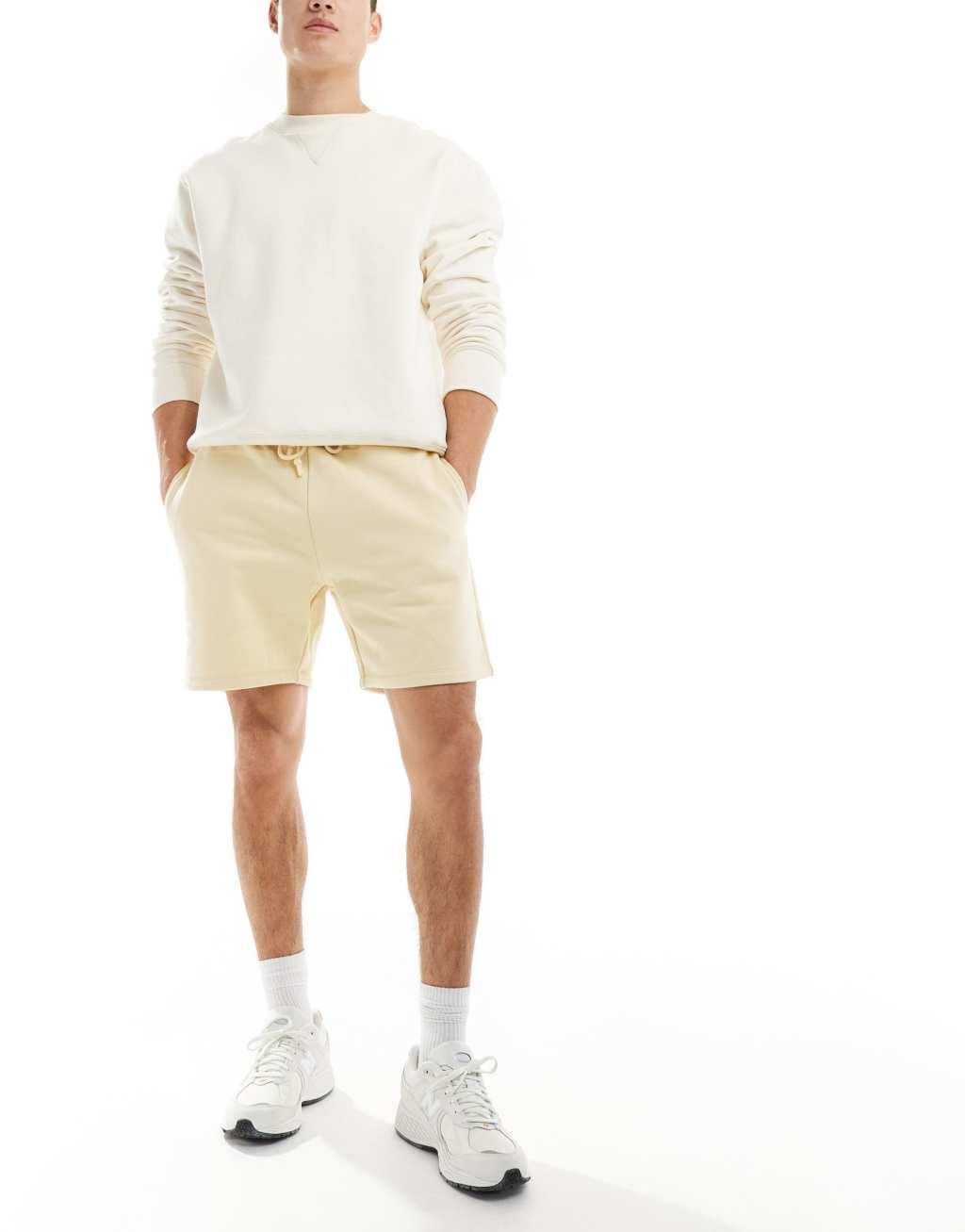ASOS DESIGN premium heavyweight oversized shorts in yellow Product Image