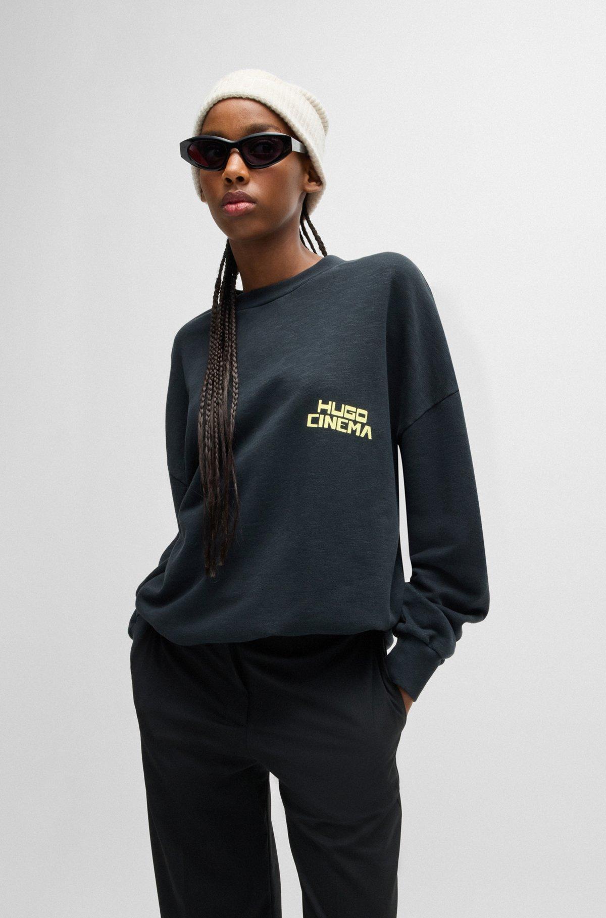 Ribbed beanie hat with embroidered handwritten logo Product Image