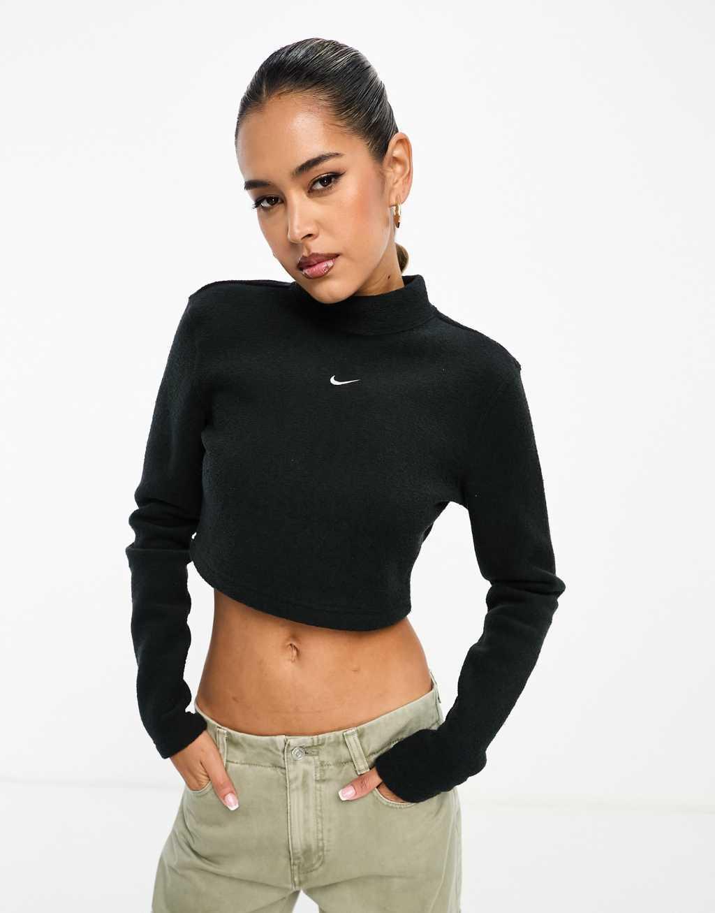 Nike Mini Swoosh Plush long sleeve top in black Product Image