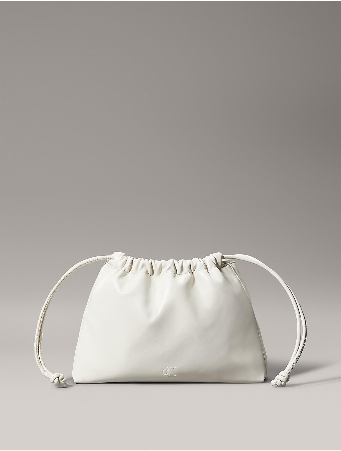 Calvin Klein Womens Monogram Logo Drawstring Crossbody Bag - White Product Image