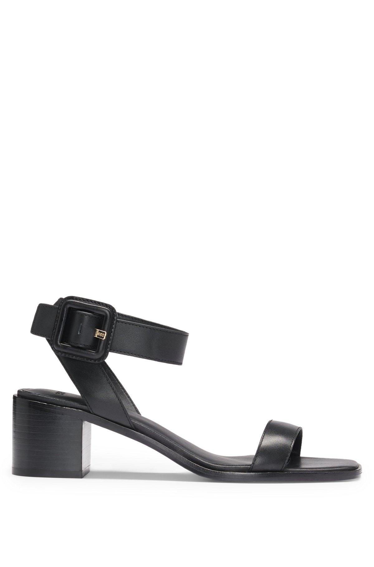 Leather sandals with block heel Product Image