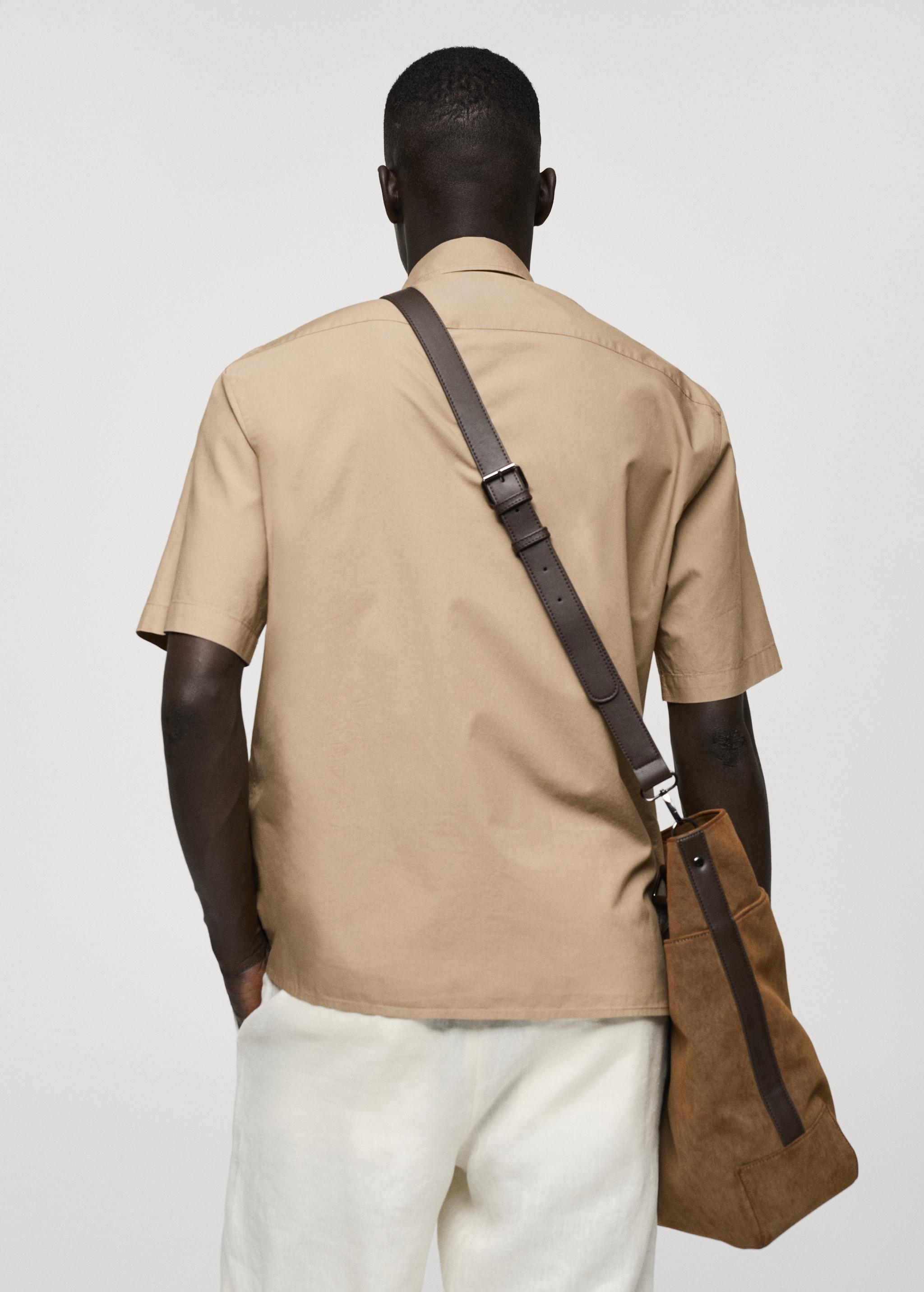 Tencel™™ cotton shirt with pocket - Men | MANGO USA Product Image