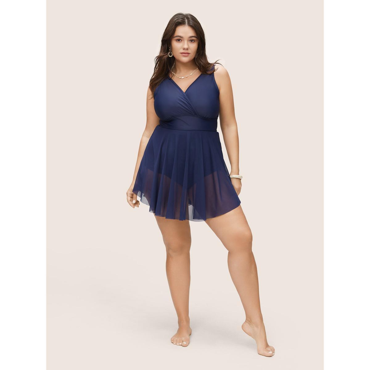 Plus Size Overlap Collar Mesh Patchwork Flutter Hem Swim Dress Women's Swimwear Indigo Beach Skinny V-neck High stretch Curve Swim Dresses BloomChic 14-16/1X Product Image
