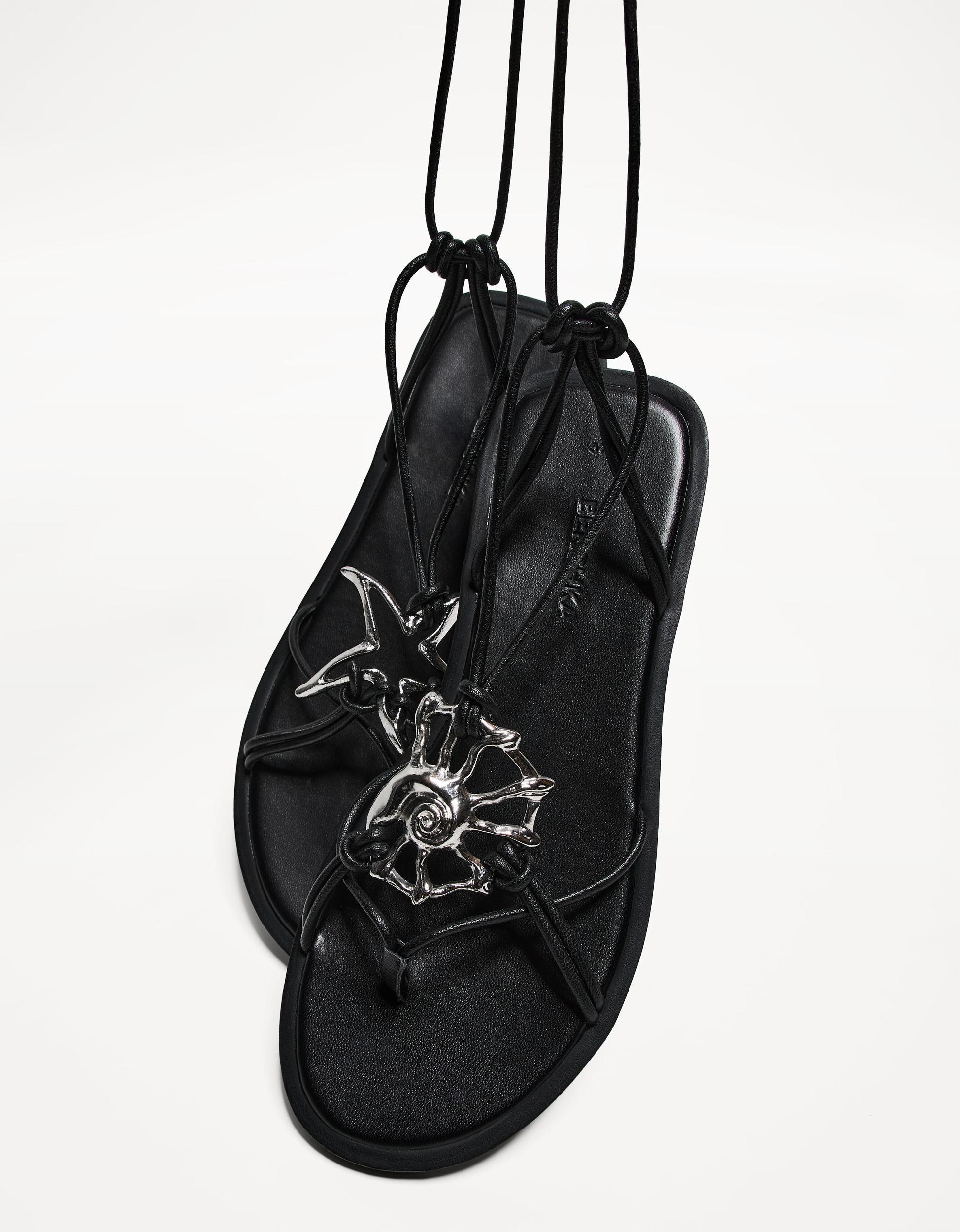 Tied flat sandals with metal detail Product Image
