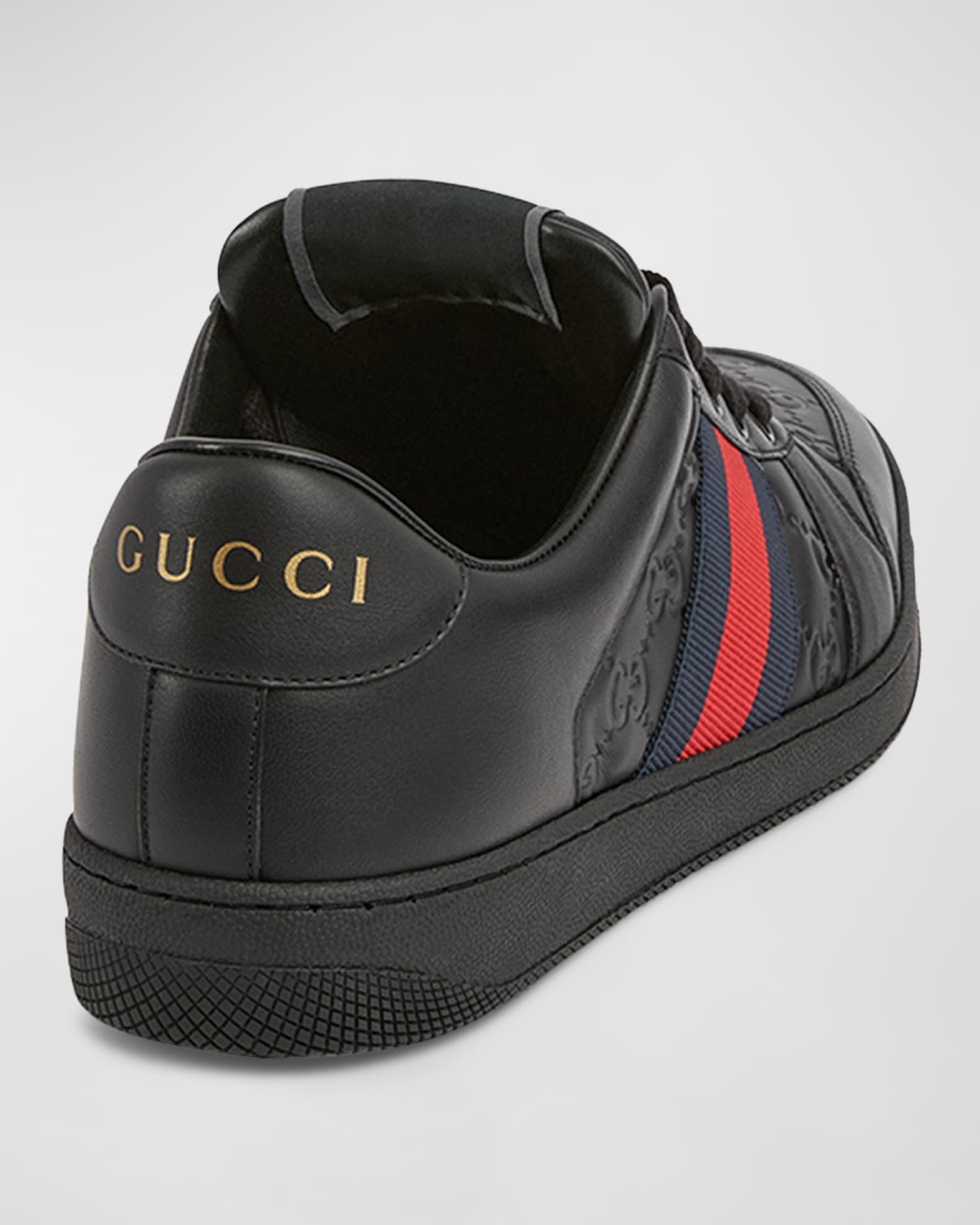 GG Embossed Leather Low-Top Sneakers Product Image