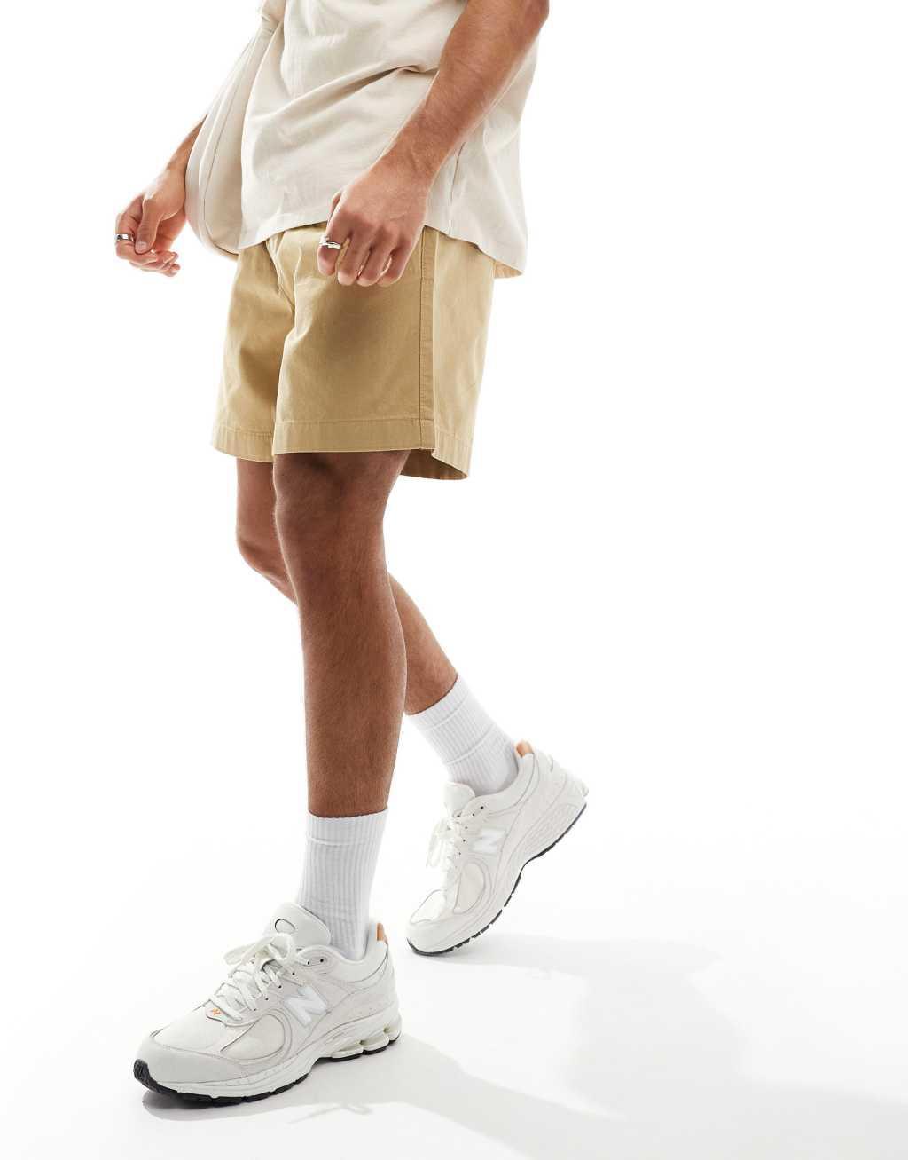 ASOS DESIGN chino shorts in tan Product Image