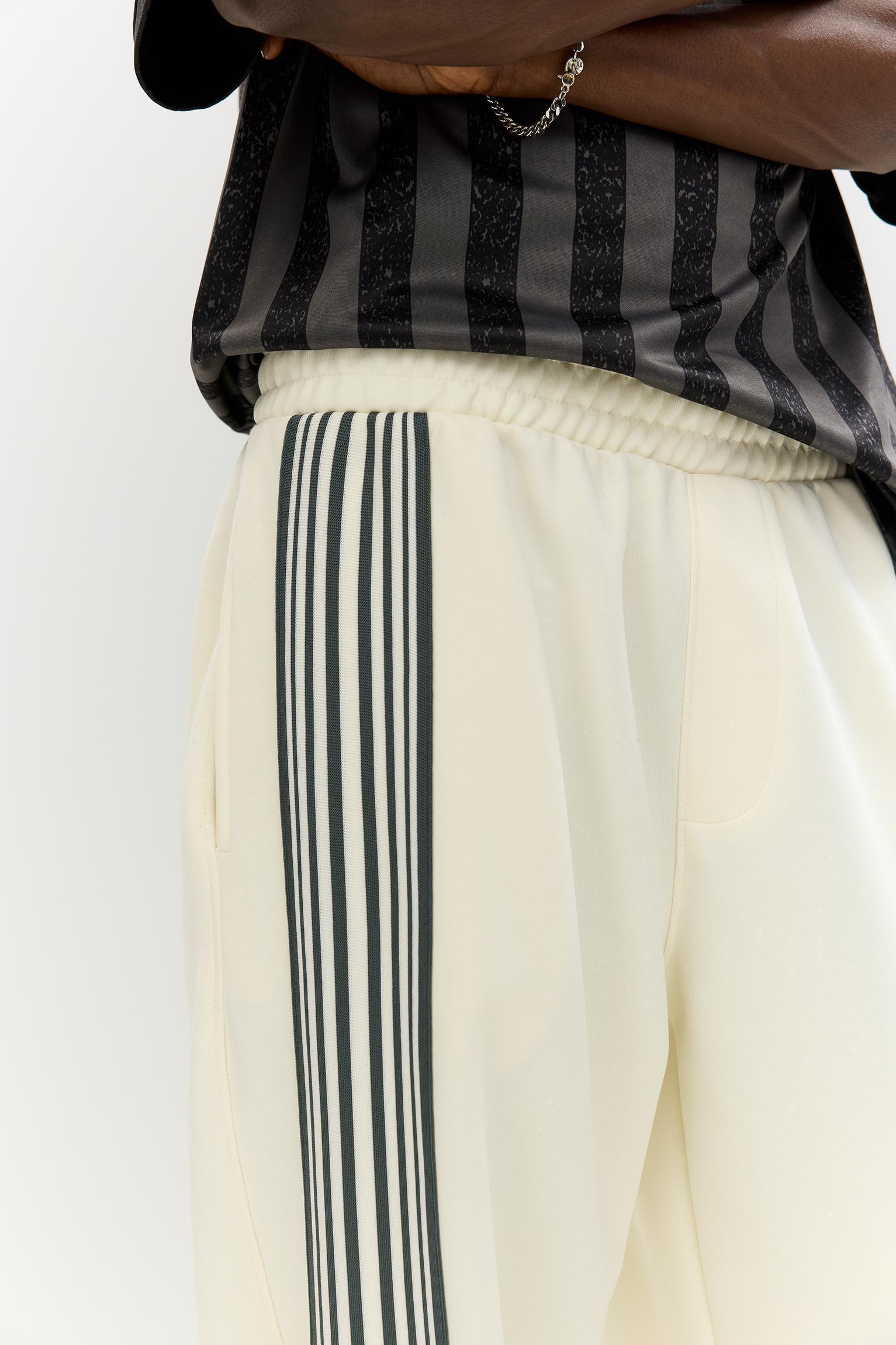 STWD tracksuit bottoms with side stripes Product Image