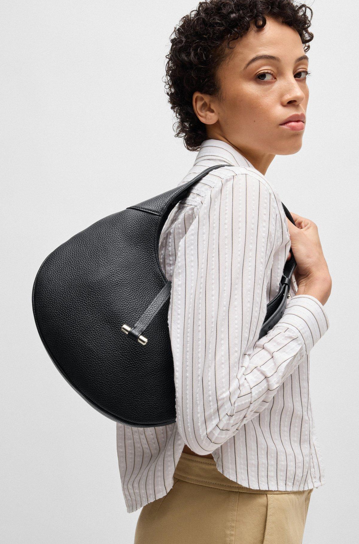 Pebbled-leather hobo bag with golden hardware Product Image