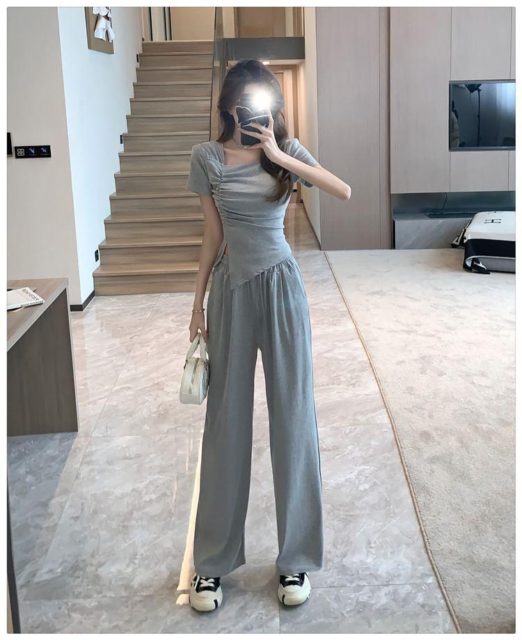 Set: Short-Sleeve Asymmetrical Neck Ruched Slit Slim Fit T-Shirt + Drawstring Waist Loose Fit Sweatpants Product Image