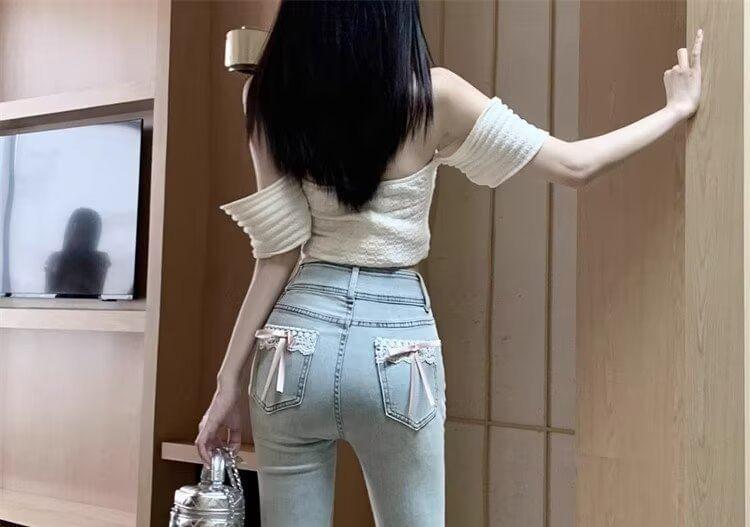 High Waist Washed Bow Lace Trim Flared Jeans Product Image