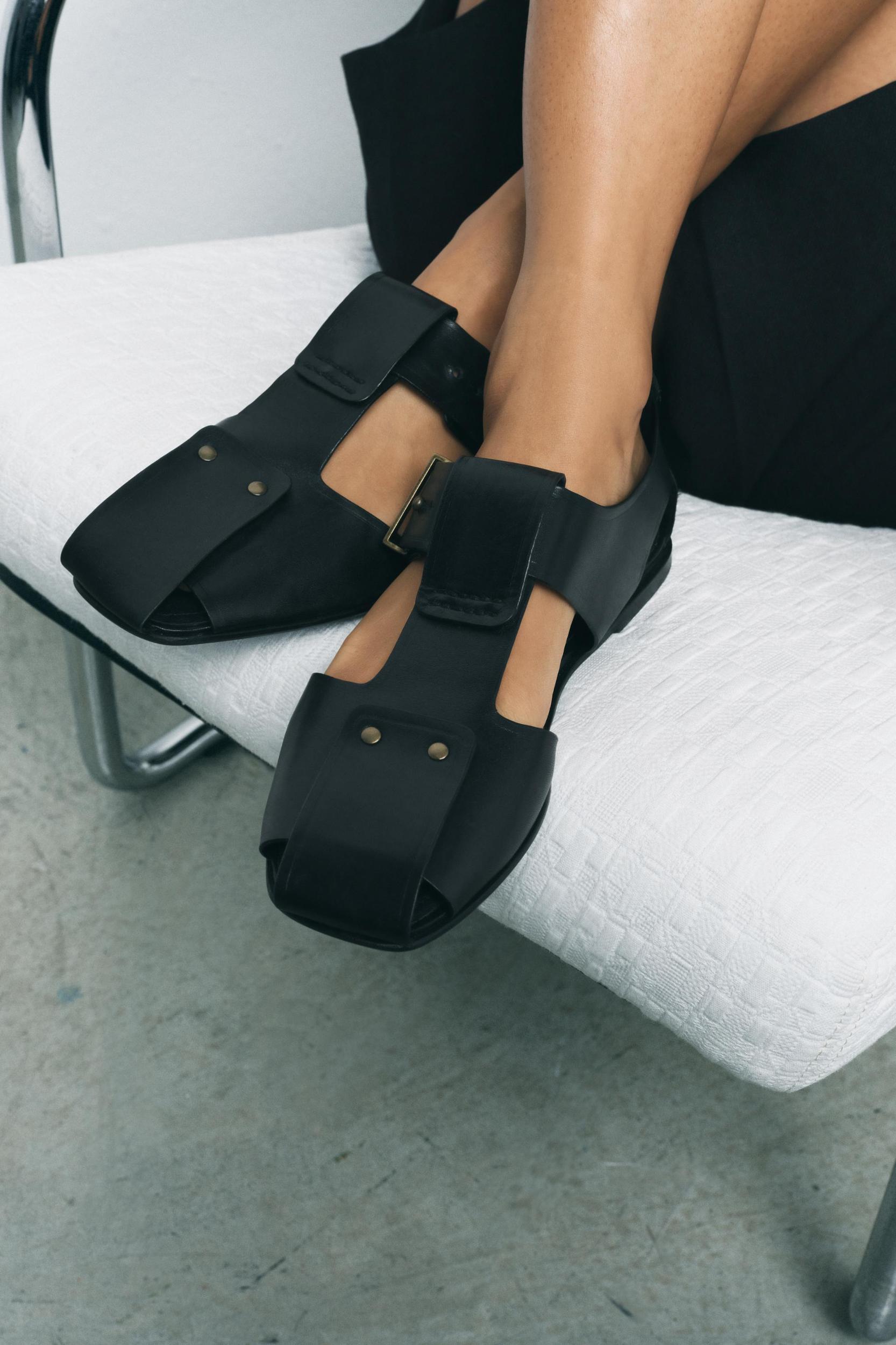LEATHER STUDDED CAGE SANDALS Product Image