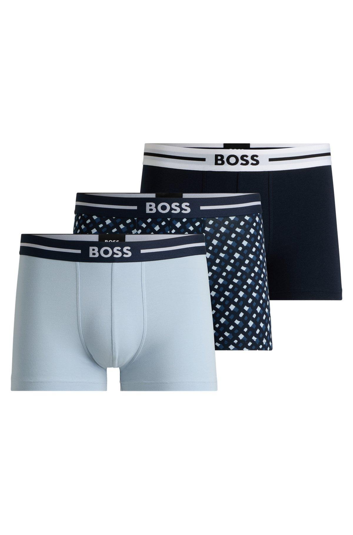 Three-pack of stretch-cotton plain and monogrammed trunks  Product Image