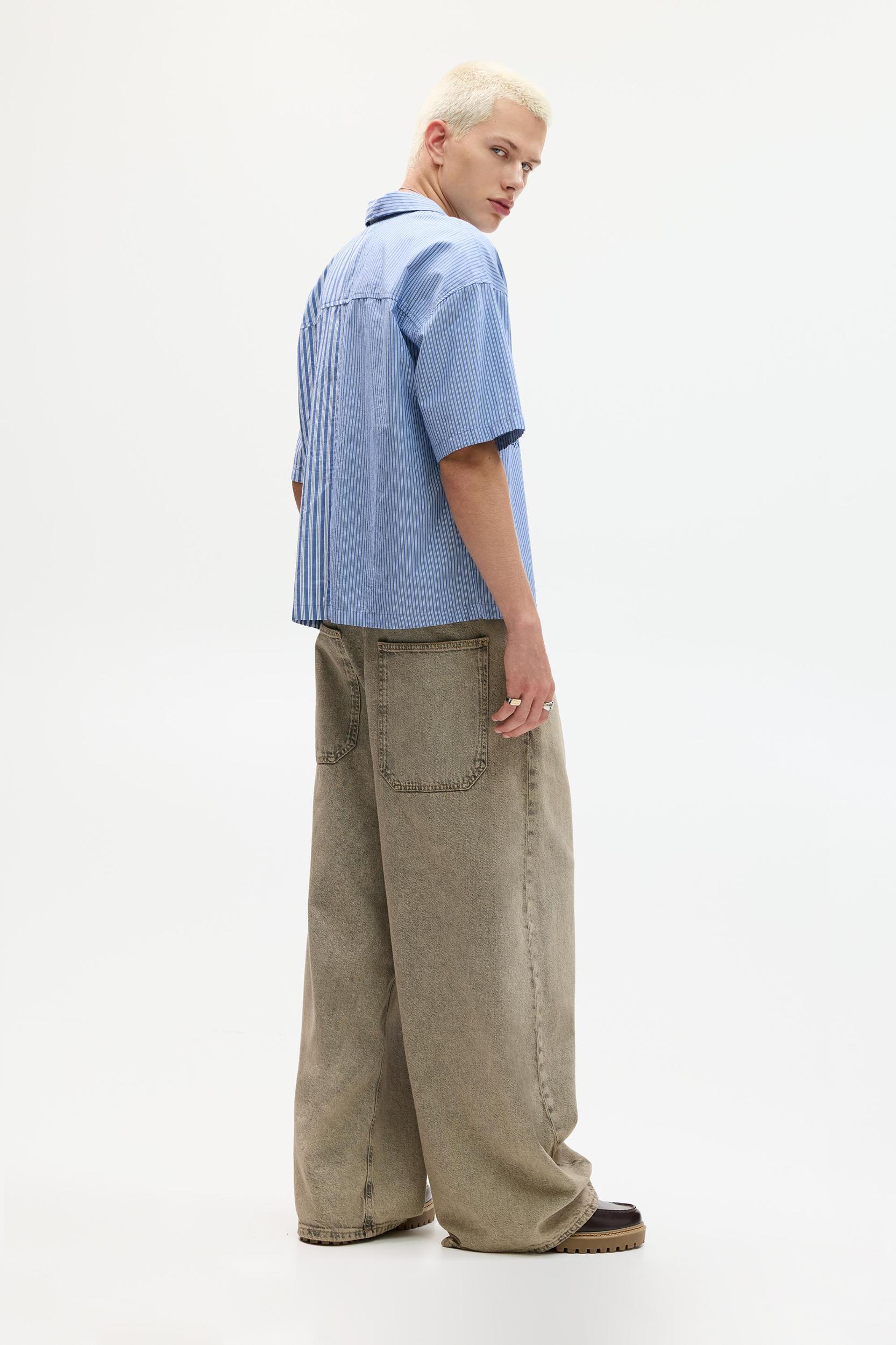 Short sleeve shirt with asymmetrical stripes Product Image