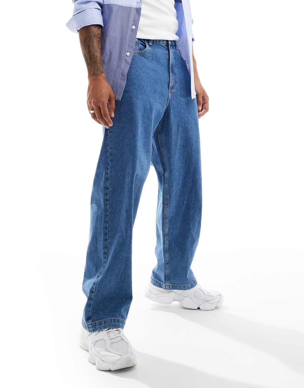 ADPT super baggy jeans in mid wash blue Product Image