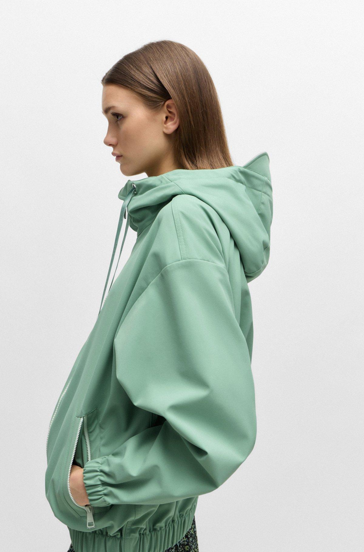 Relaxed-fit hooded jacket in water-repellent stretch fabric Product Image