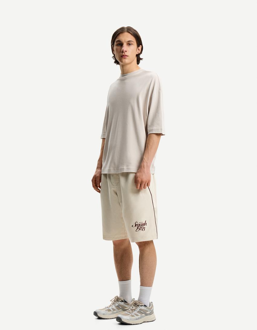 Technical Bermuda sweat shorts Product Image