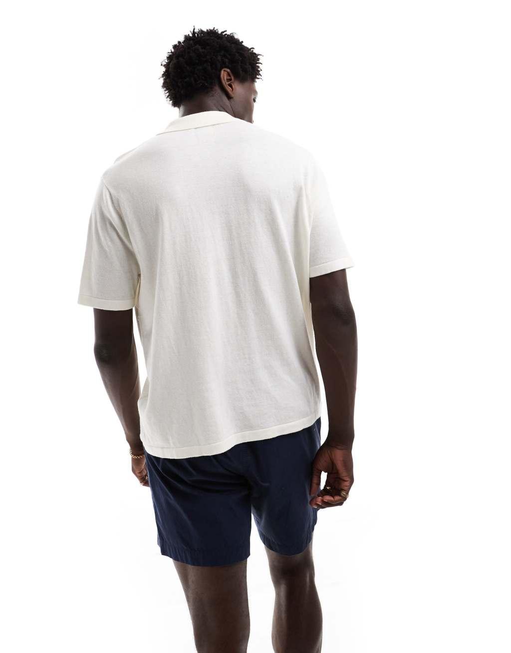 ASOS DESIGN relaxed knit button up polo with dragonfly embroidery in ecru Product Image