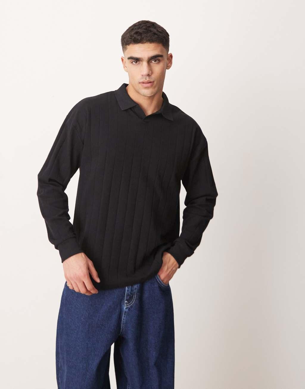 ASOS DESIGN oversized long sleeve textured ribbed polo with camp collar in black Product Image