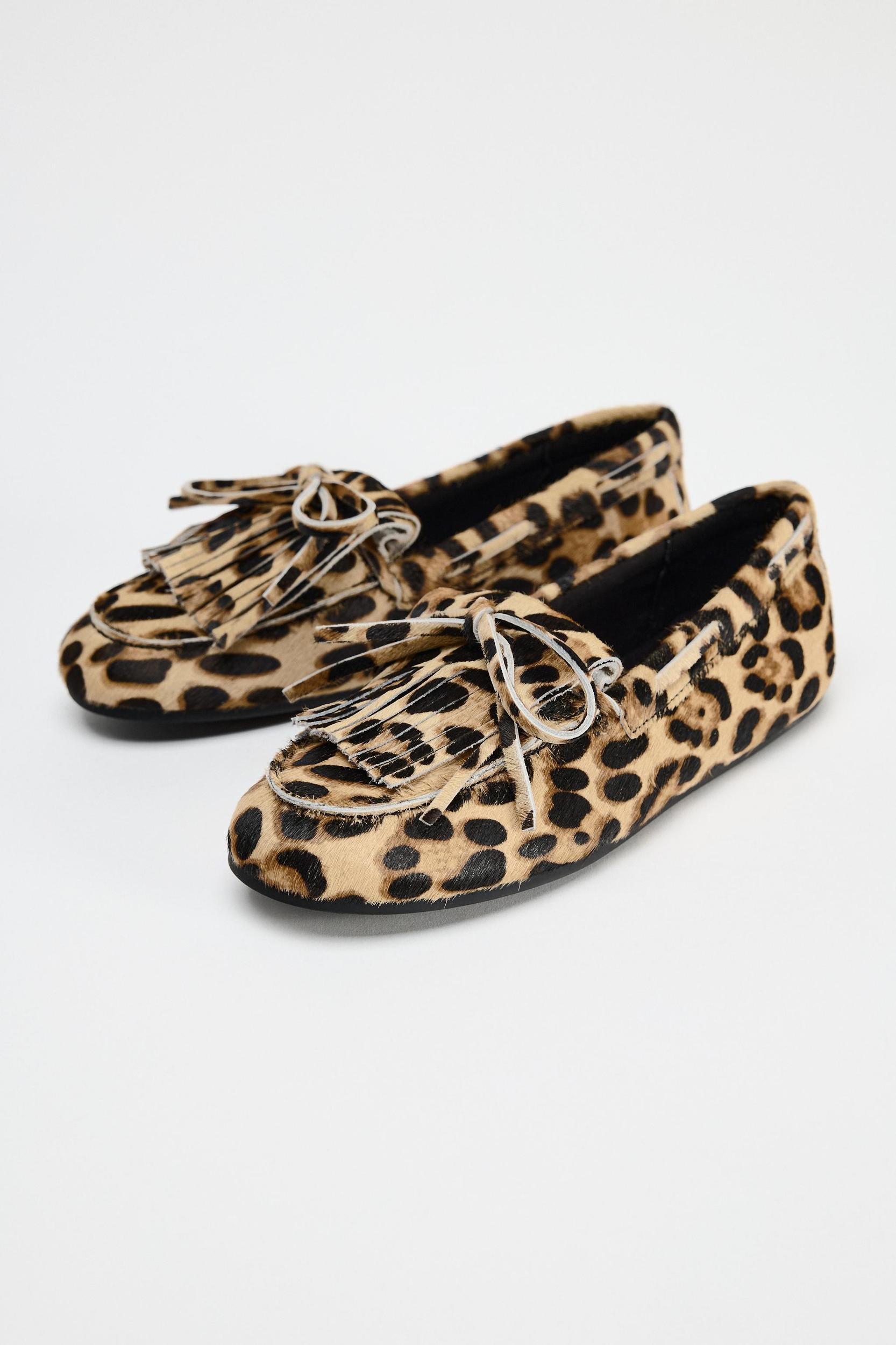 ANIMAL PRINT FUR LINED LEATHER LOAFERS Product Image
