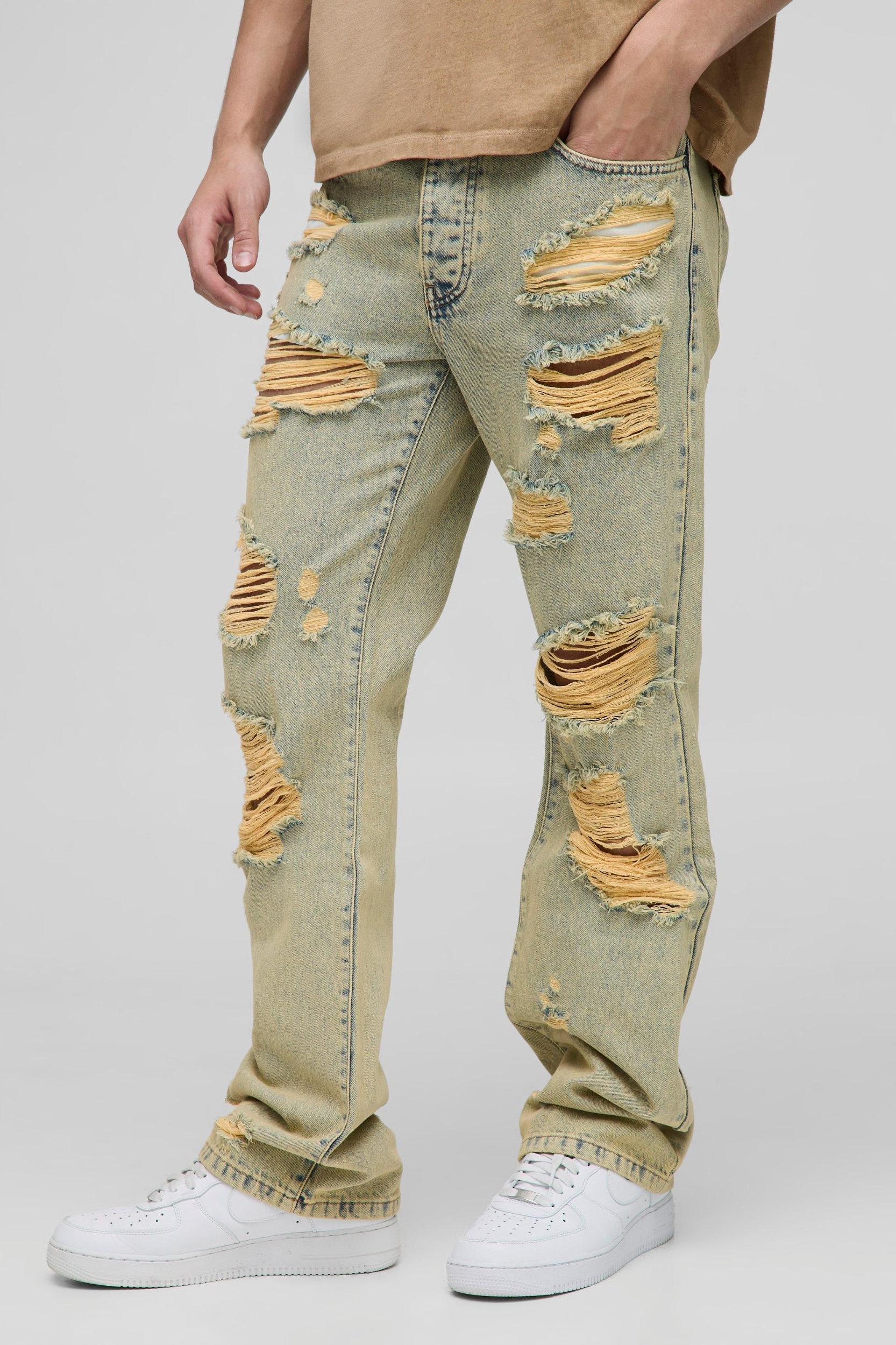 Slim Flared Knee Ripped Bleach Washed Jeans | boohooMAN USA Product Image