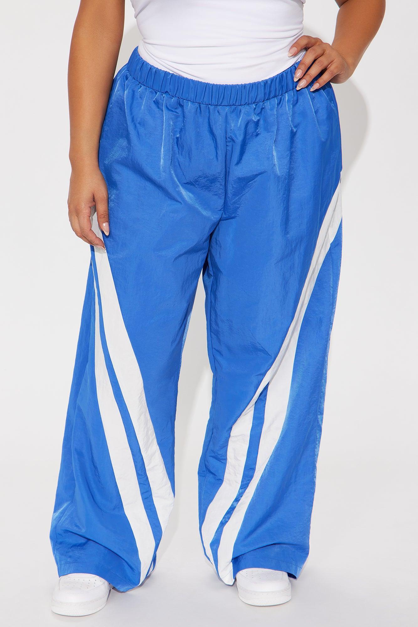 Follow The Curve Windbreaker Track Pant - Blue Product Image