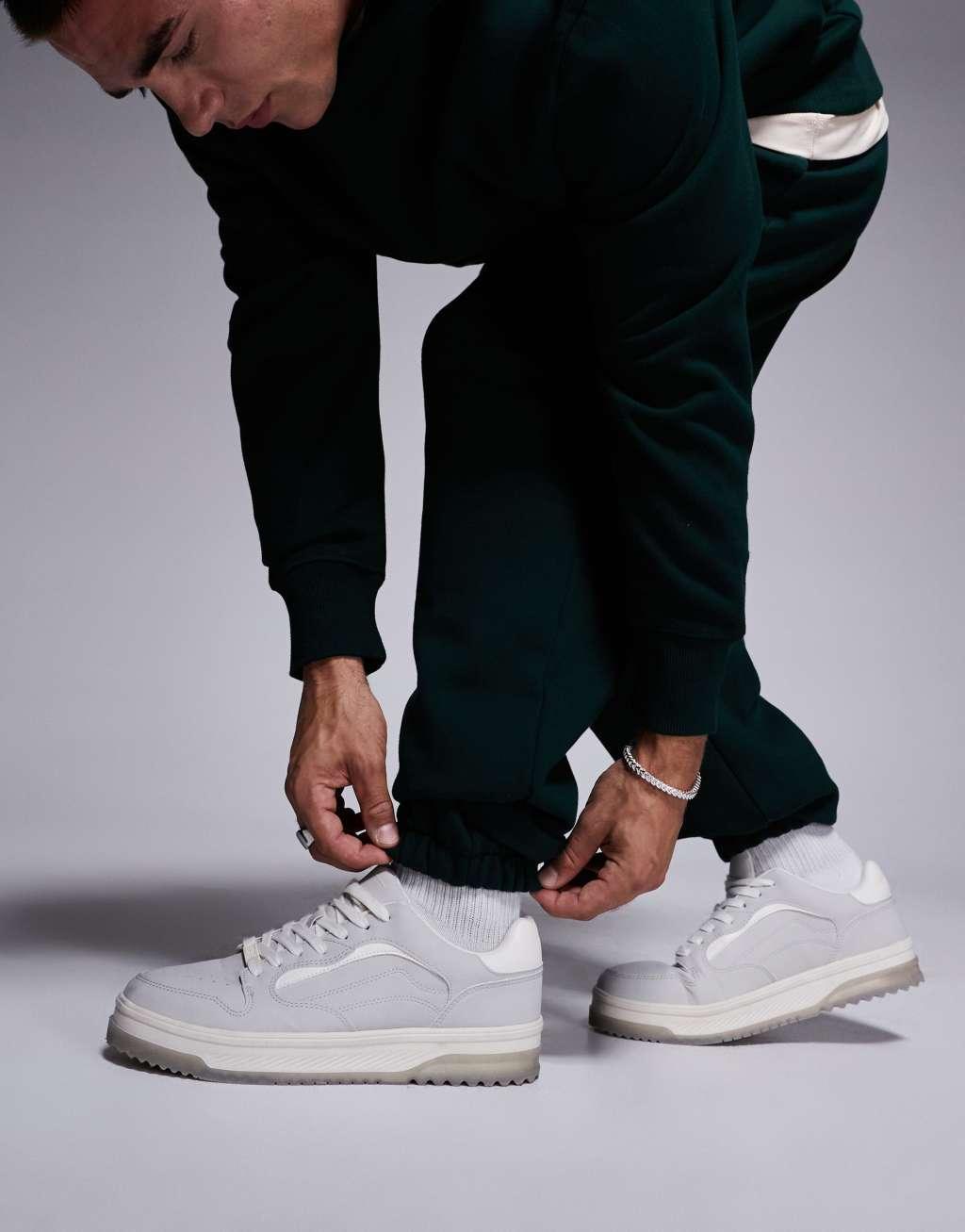 ASOS DESIGN premium heavyweight oversized sweatpants in forest green Product Image