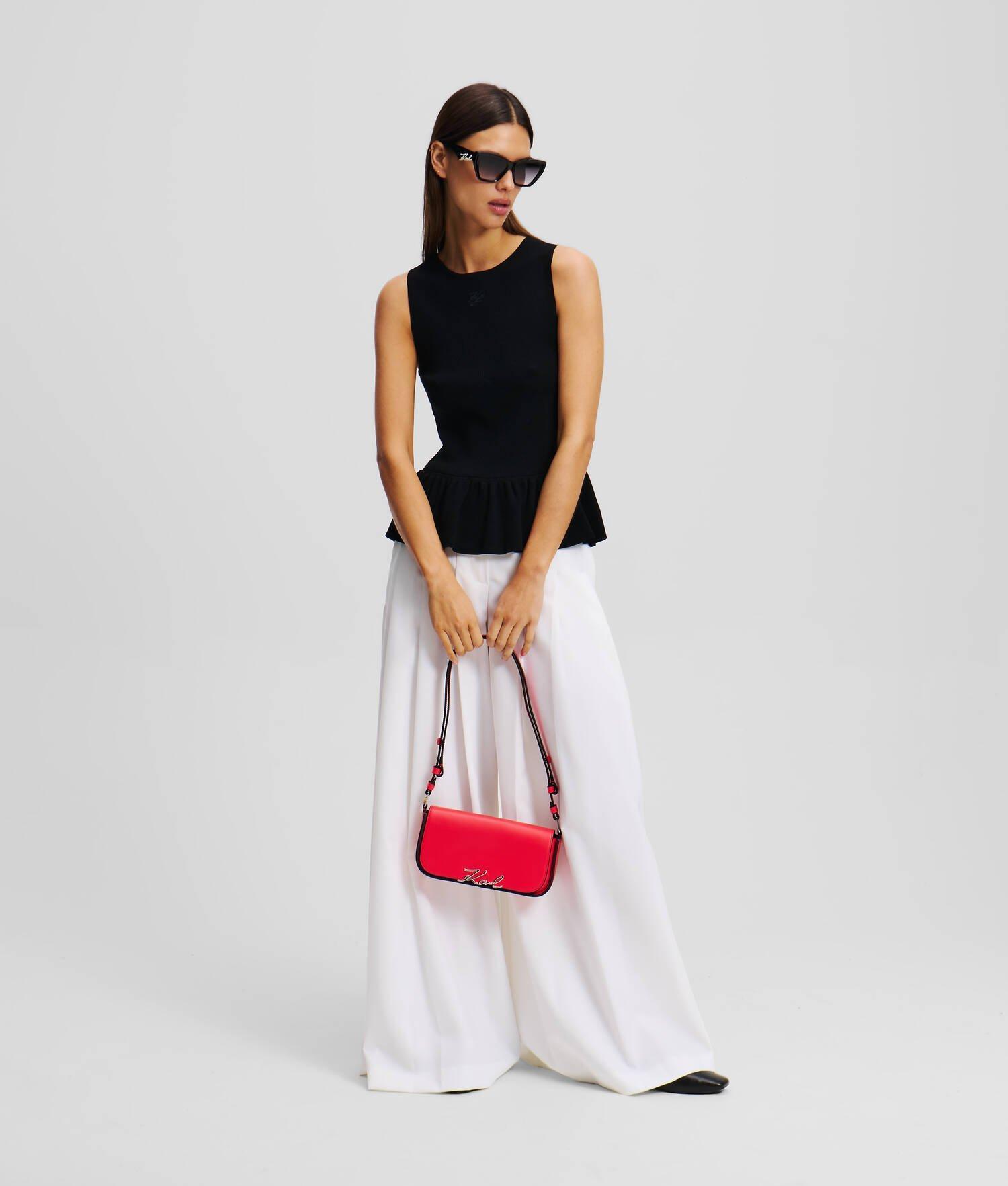 SLEEVELESS PEPLUM KNIT TOP Product Image