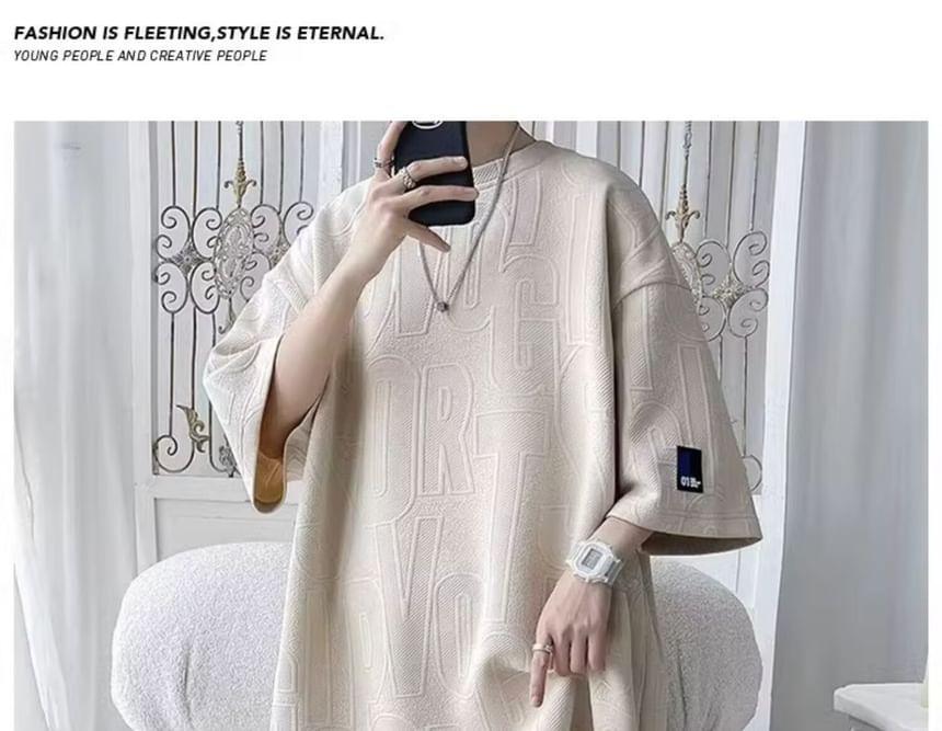 Set: Elbow-Sleeve Crew Neck Lettering Embossed Applique T-Shirt + Drawstring Waist Sweat Shorts Product Image