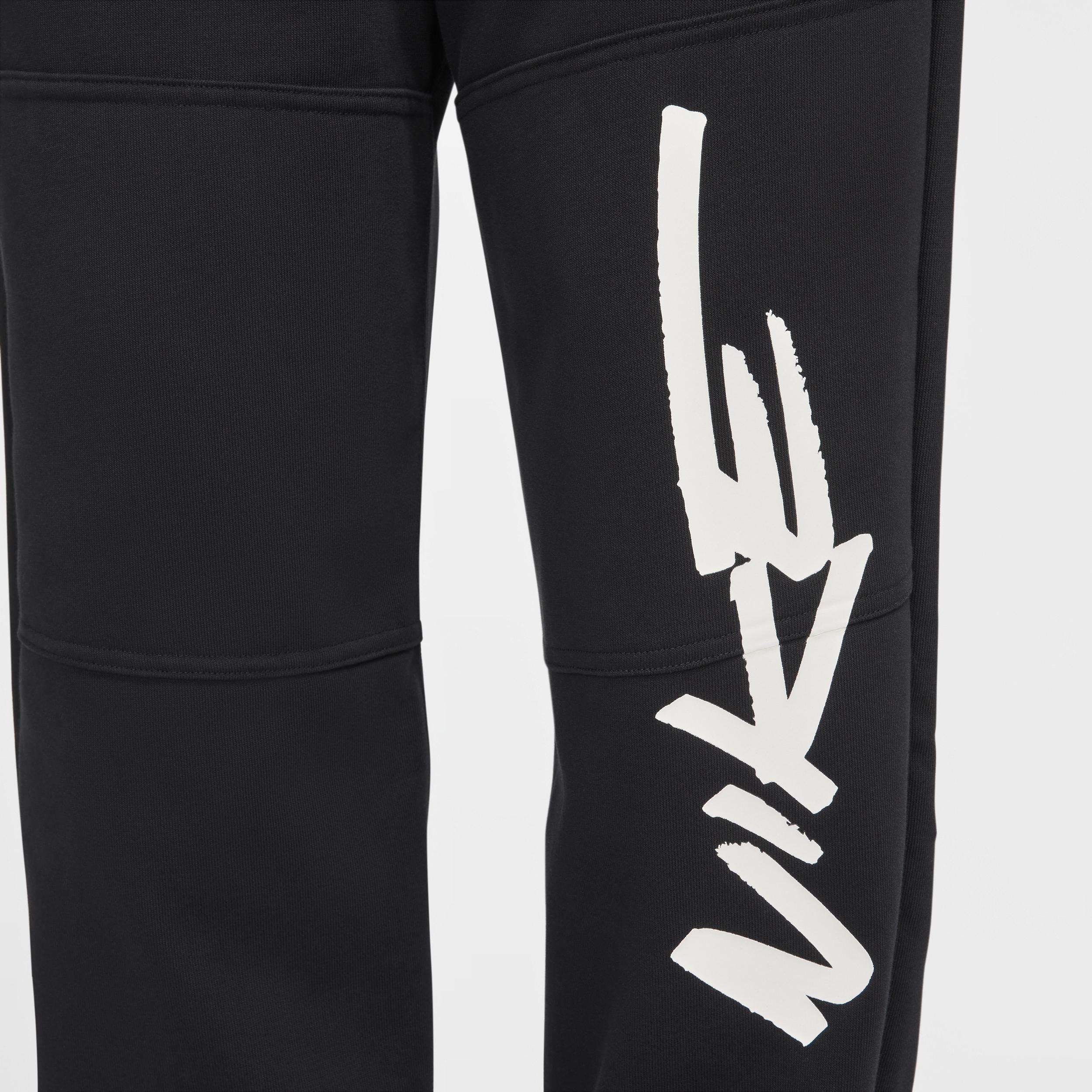 Nike Sportswear Breaking Women's Mid-Rise Oversized French Terry Pants Product Image
