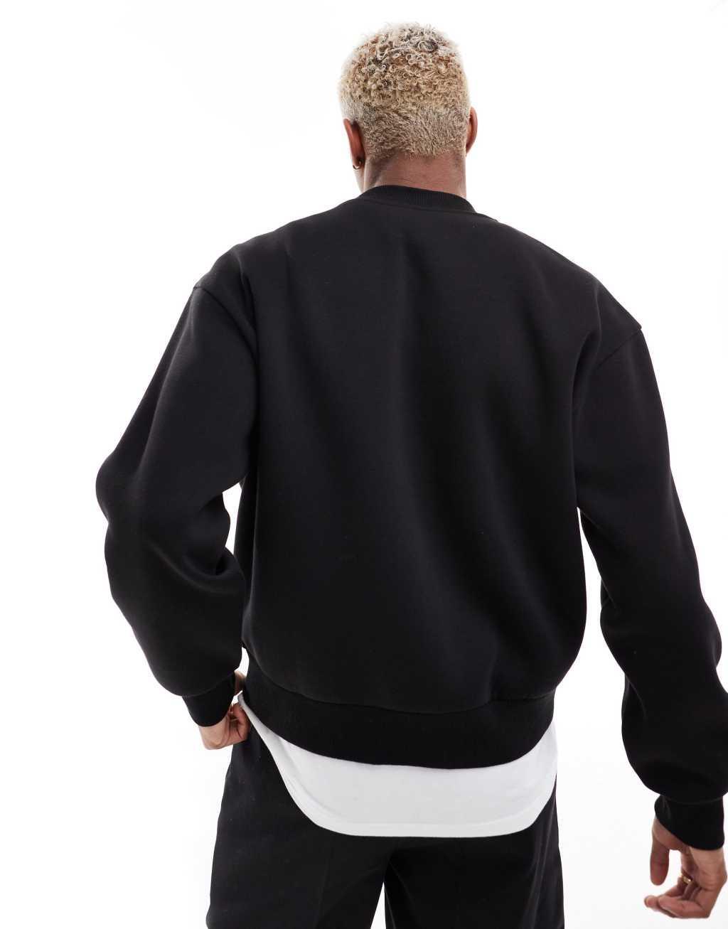 ASOS DESIGN boxy oversized sweatshirt in black Product Image