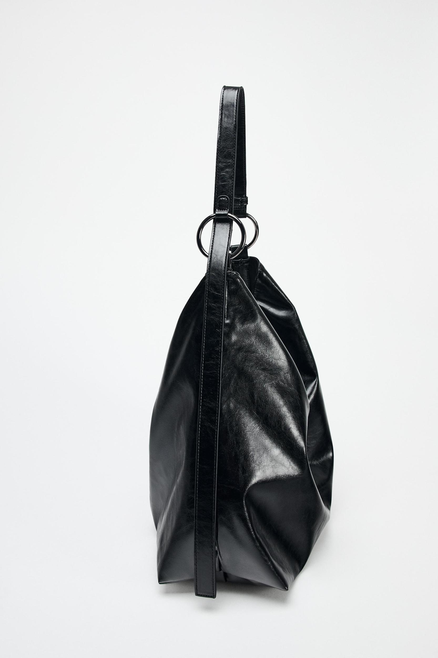 REVERSIBLE SLOUCHY BUCKET BAG Product Image