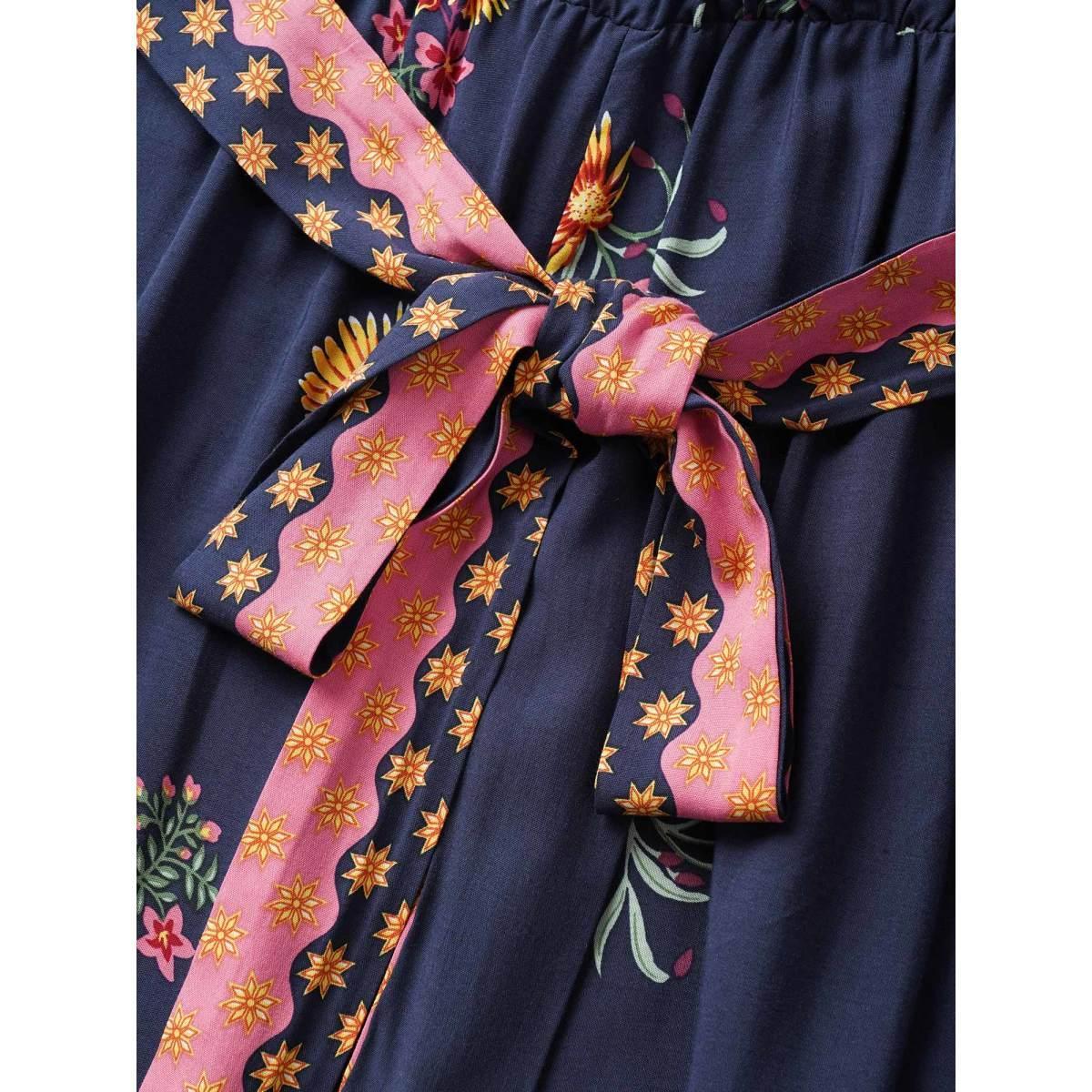 Plus Size Indigo Boho Print Overlap Collar Belted Sleeveless Jumpsuit Women Resort Cap Sleeve V-neck Vacation Loose Jumpsuits BloomChic 22-24/3X Product Image