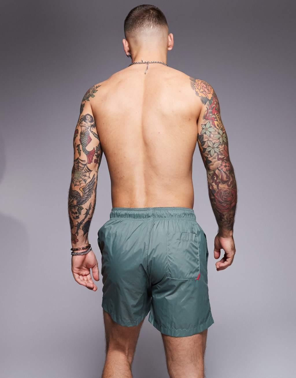 HUGO Haiti swim shorts in green Product Image