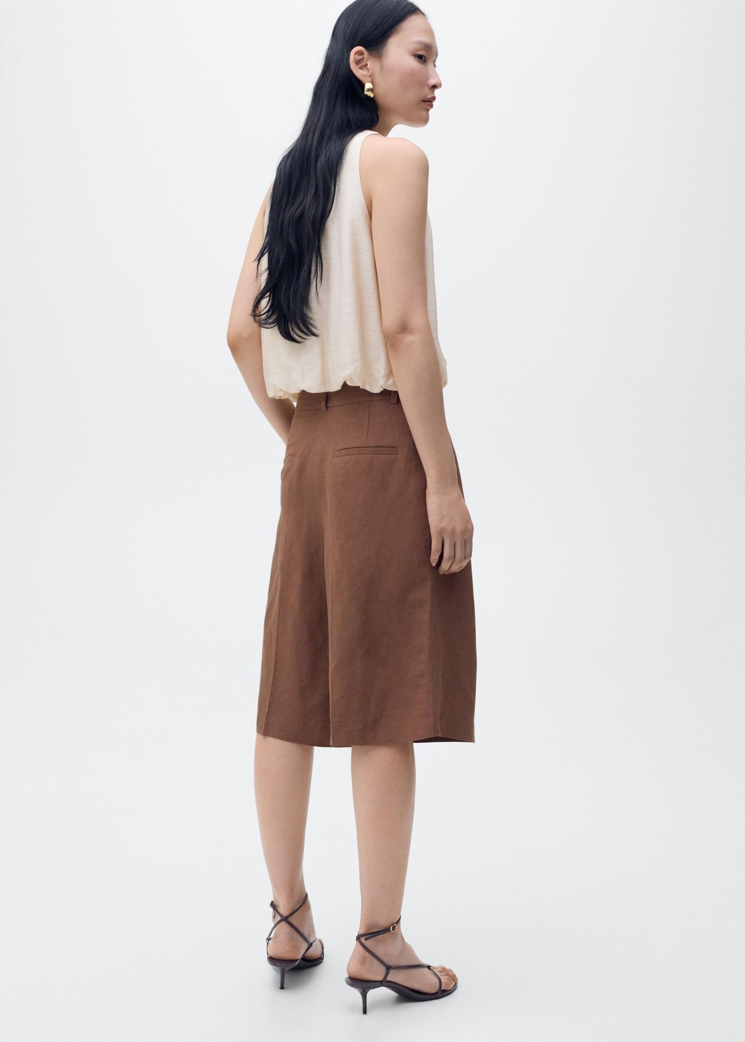 Lyocell-blend top with puffed hem - Women | MANGO USA Product Image