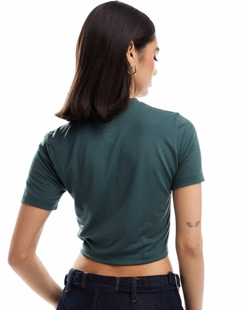 Nike Essential slim cropped t-shirt in dark green Product Image