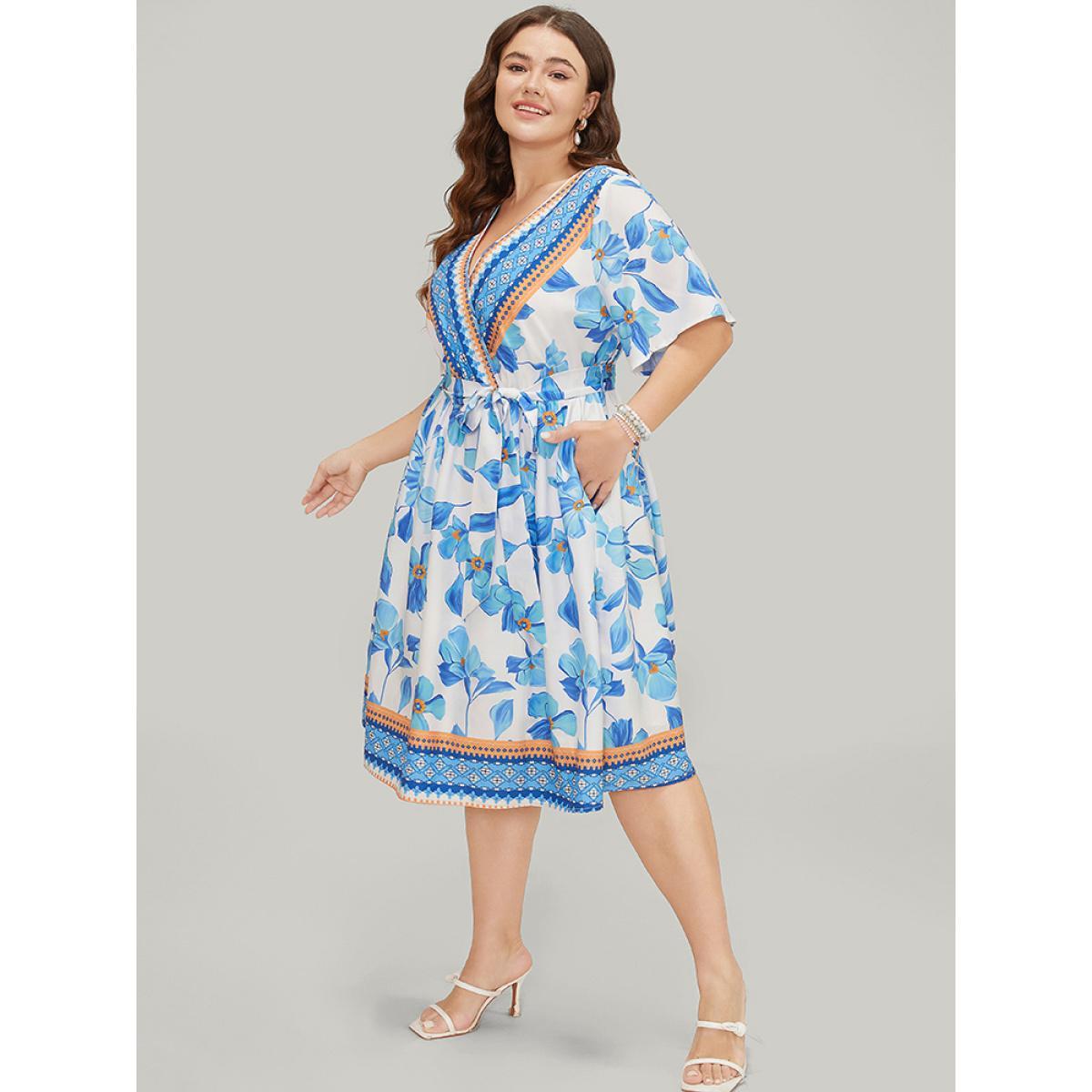 Plus Size Bandana Print Ruffle Hem Belted Pocket Wrap Dress LightBlue Women Vacation Cross straps V-neck Short sleeve Curvy Knee Dress BloomChic 30/6X Product Image